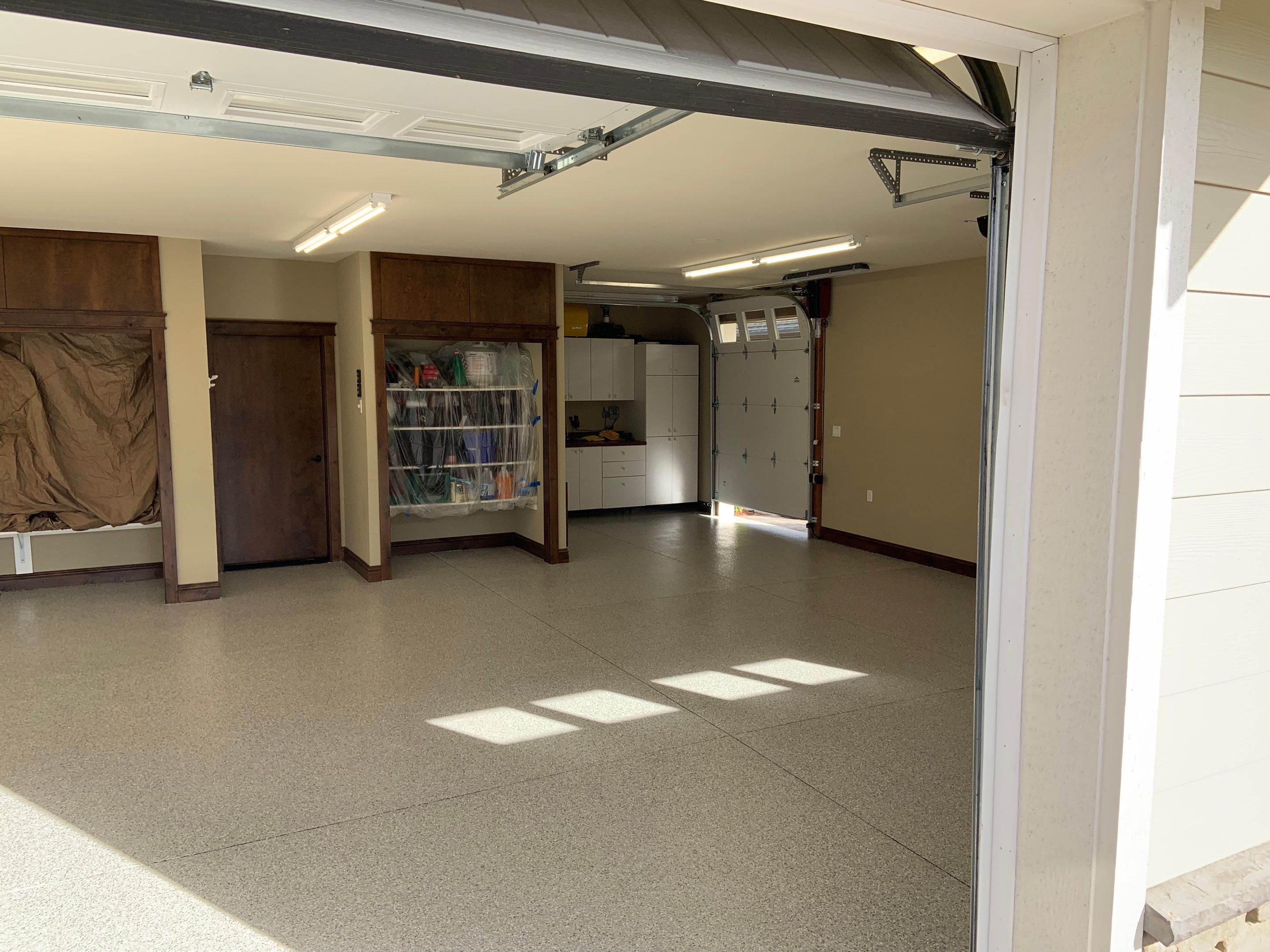 Garage Transformation using Mt Everest by Croc Coatings, LLC