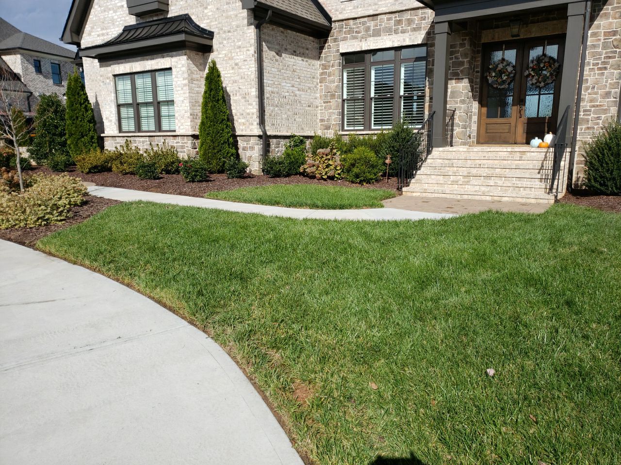 Driveway Clean using cleaner by Power Wash Masters LLC