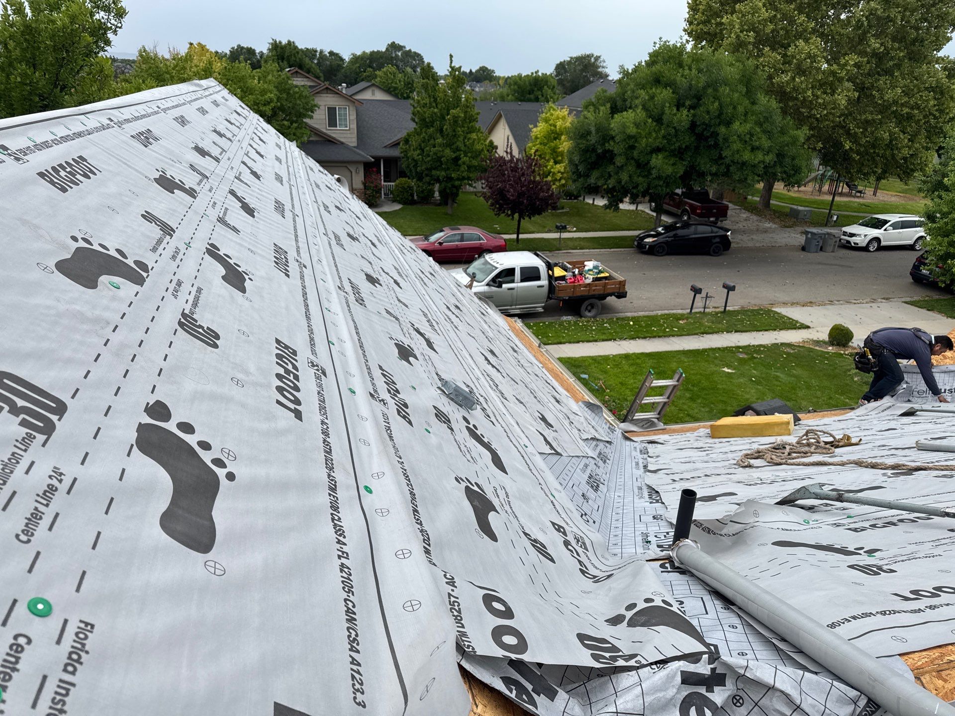 Residential Roof Replacement Featuring Charcoal Grey Architectural Shingles by Olive Roofing