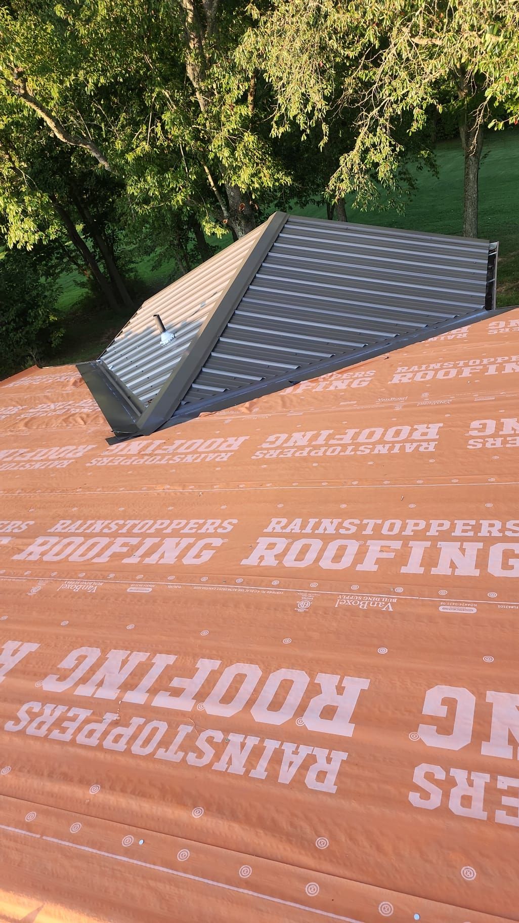 Residential Roofing Installation using Metal by Rainstoppers Roofing