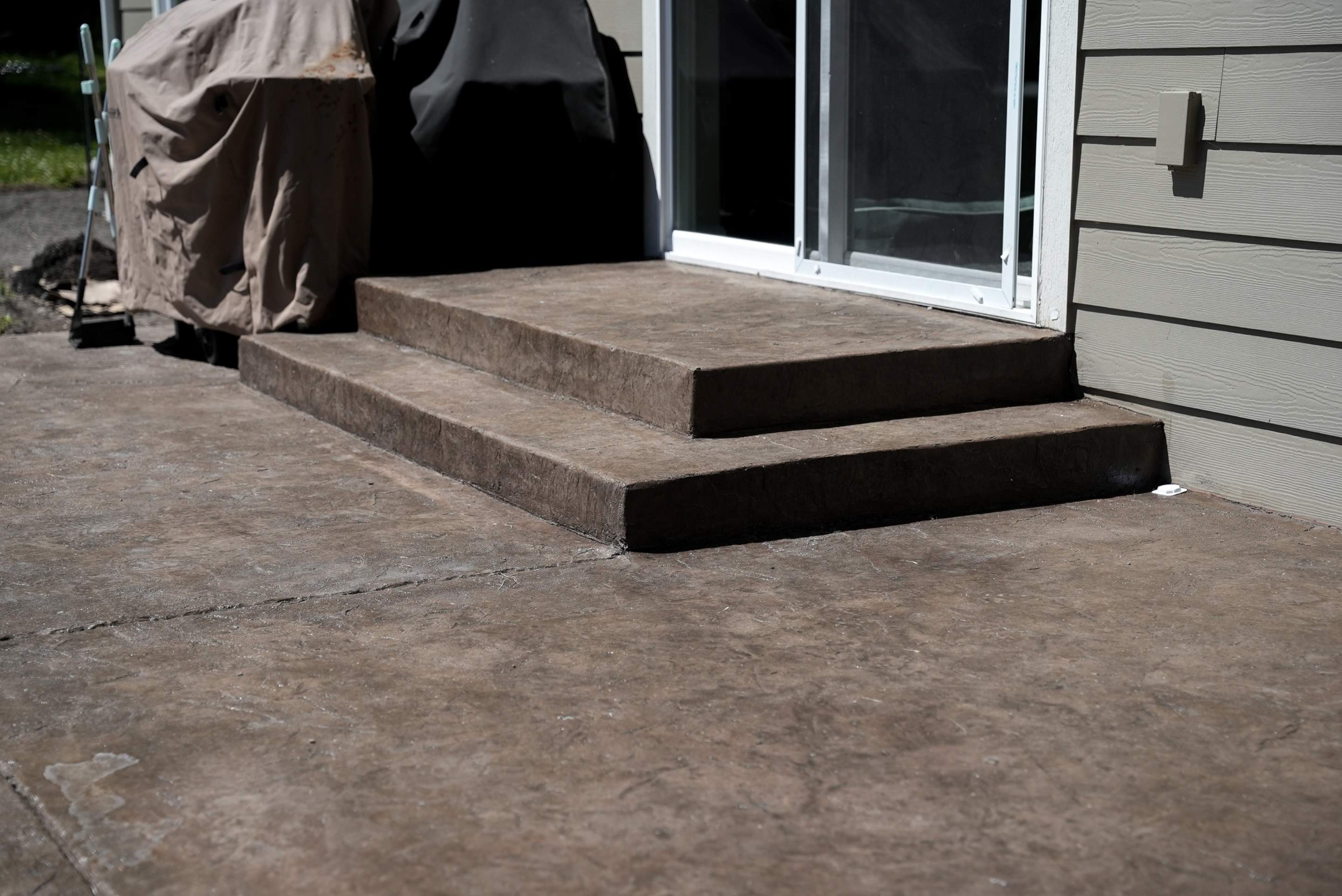Mandy | Stamped Concrete Patio & Driveway by Jireh Asphalt & Concrete Inc 