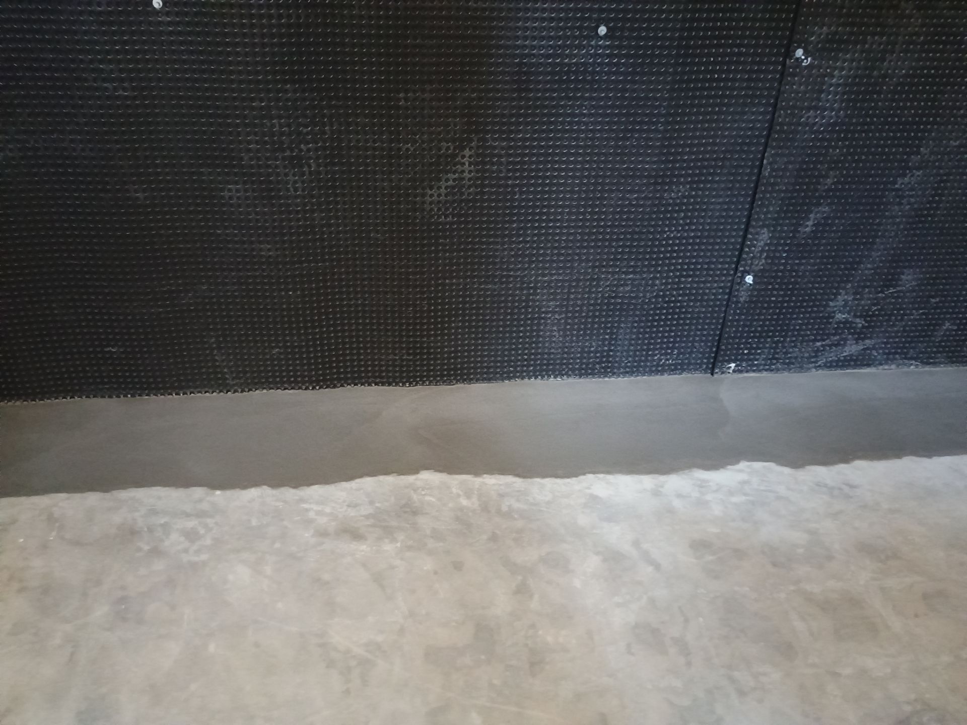 Interior Drain Tile & Wall Drainage in Southwest Minneapolis by Waterproofing Northeast