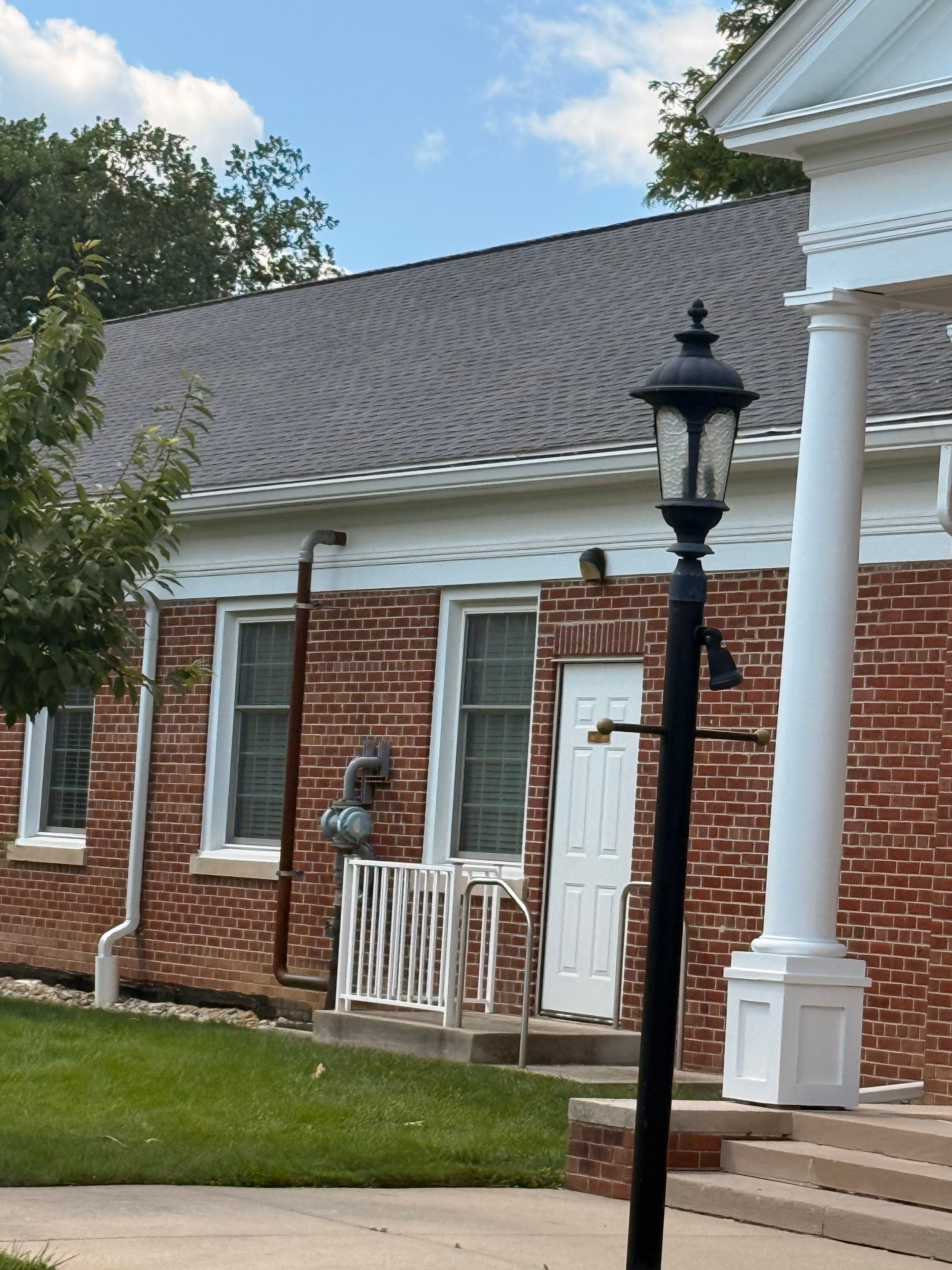 Commercial Wood Trim Restoration and Gutter Replacement in Birmingham by Top Shelf Painter
