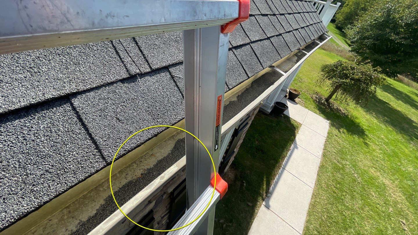 Roof Damage using Certainteed Lifetime Roofing System- Moire Black Landmark Pro shingkes with shadow ridge caps. by BulletpROOF Exteriors