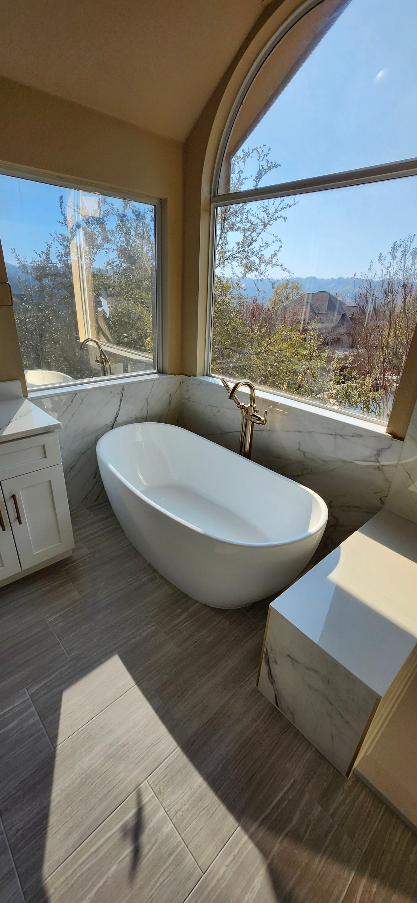 Stone Oak Bathroom Remodel with Freestanding Tub & Walk-In Shower by Legacy Bath and Kitchen