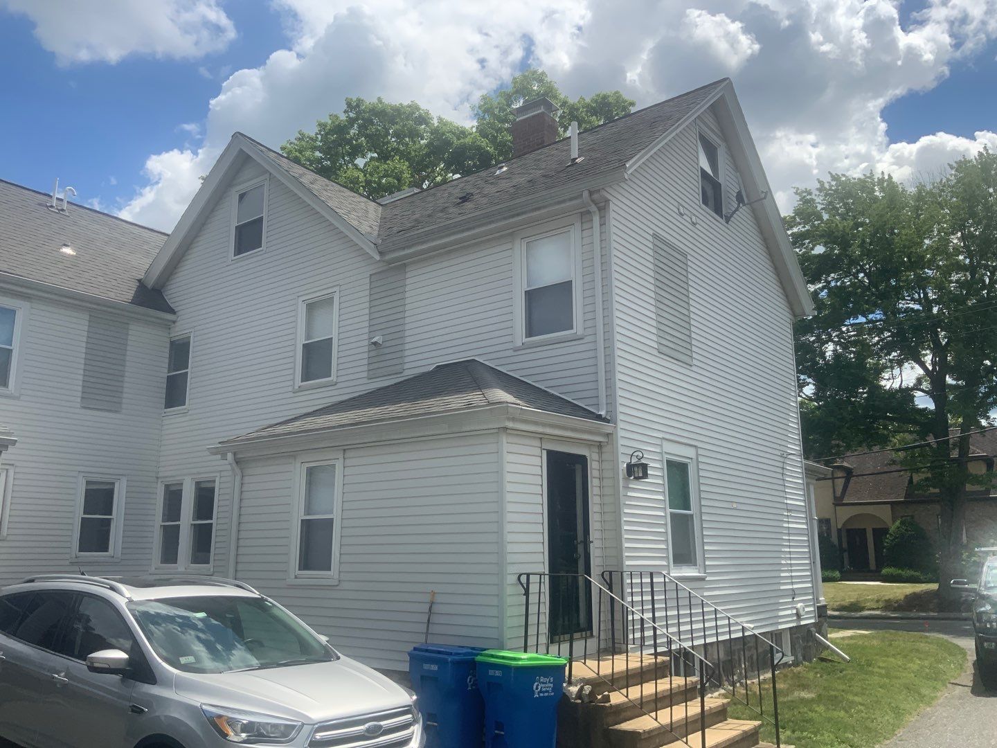 Vinyl siding layover project for 2 family in Wellesley, MA by UBrothers Construction