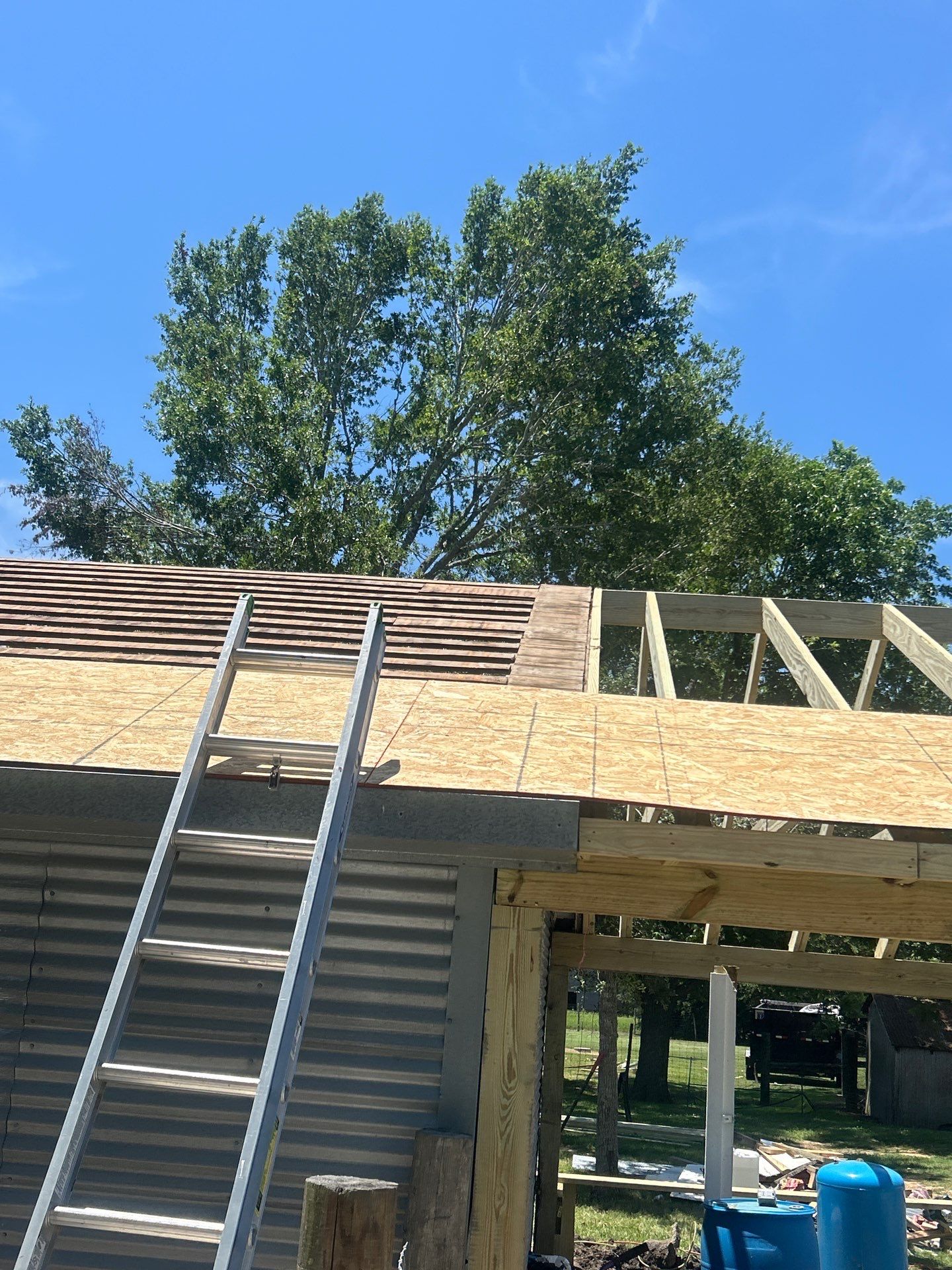 Residential Roofing Installation using Metal by Roof Repair Company