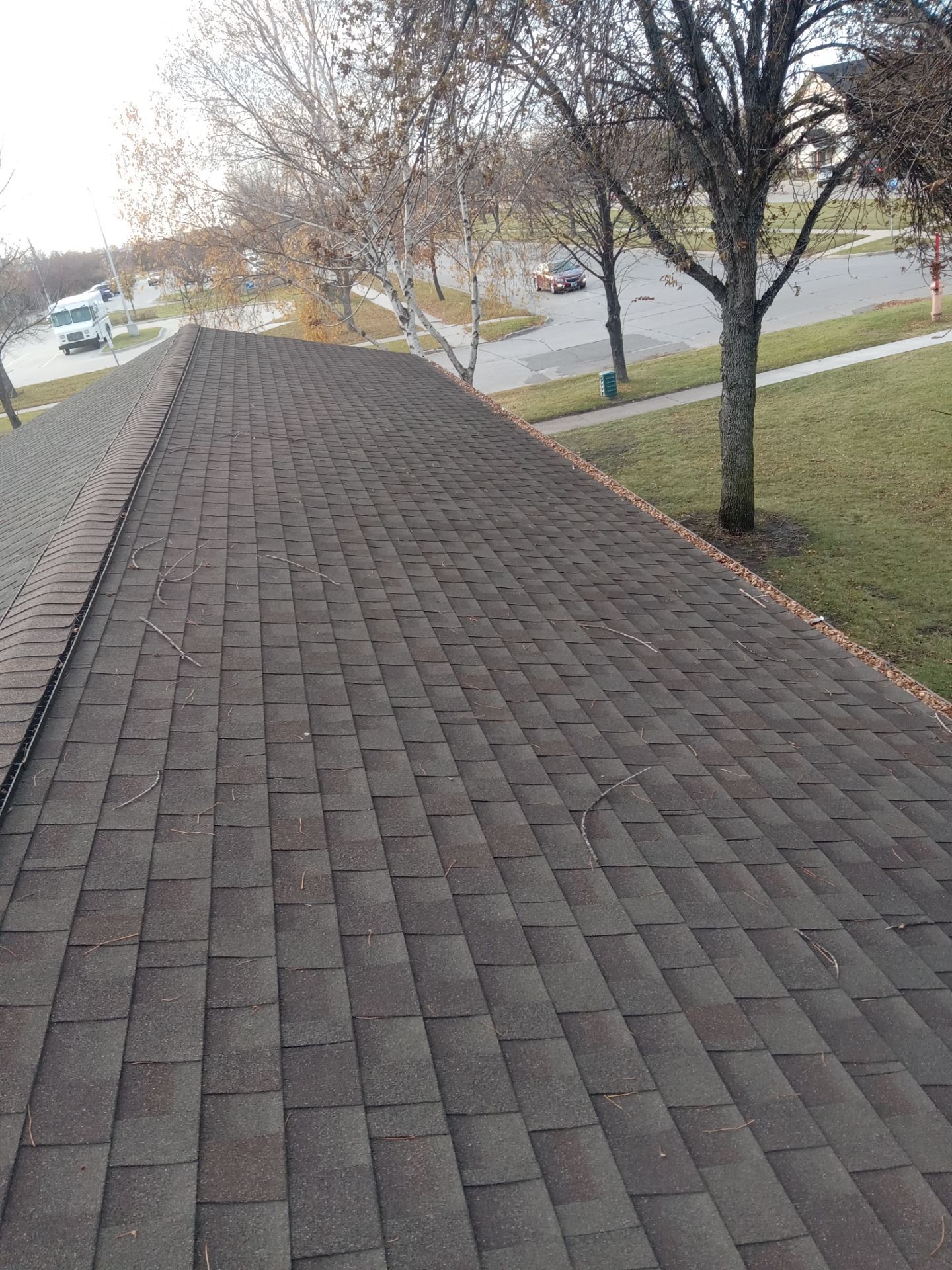 Commercial gutter cleaning North Dakota before photo with filled gutters
