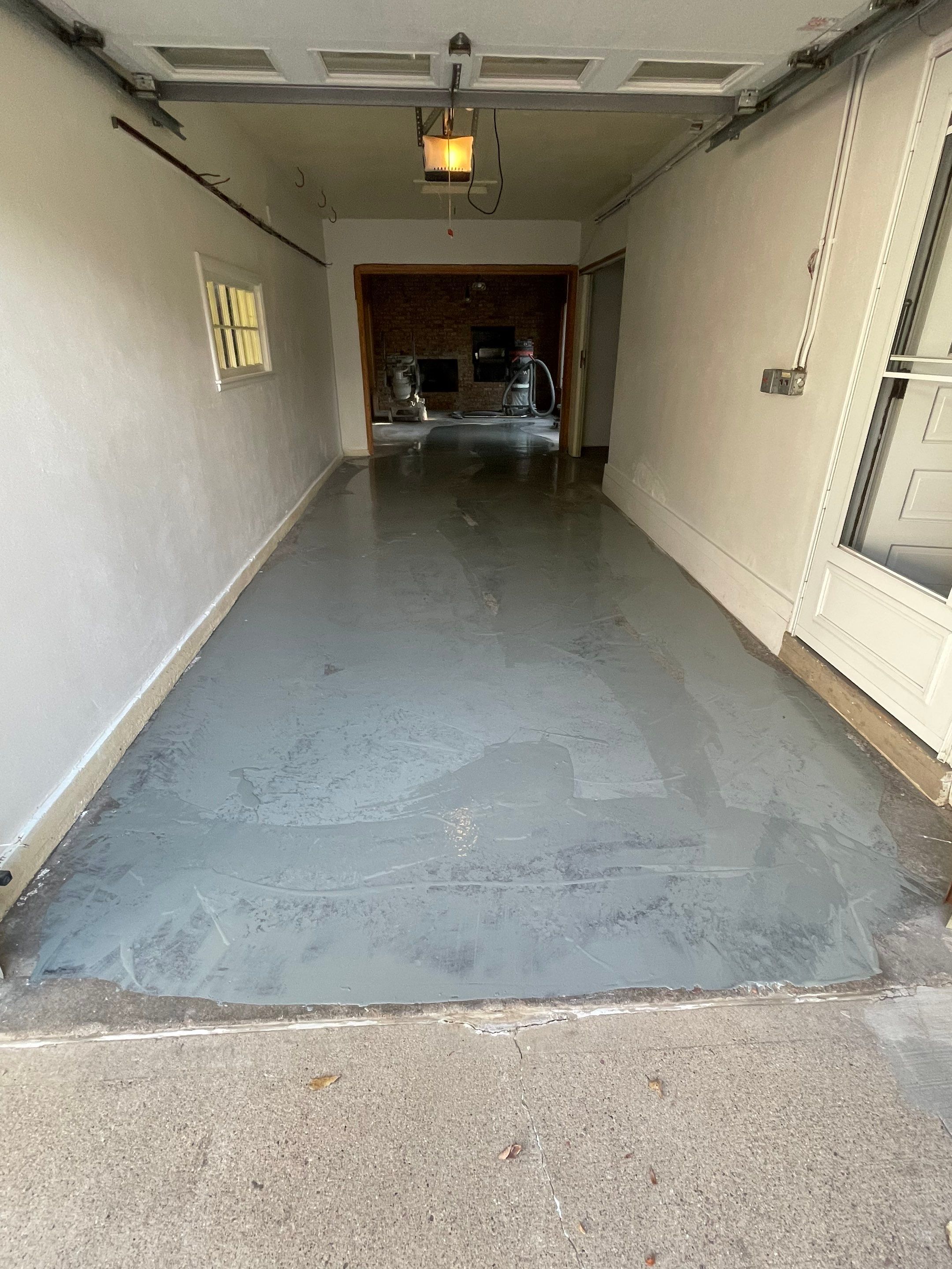 Sioux Falls Garage and Sunroom Concrete Coating with Coyote Flake by Select Painting, Coatings & Garage Cabinets