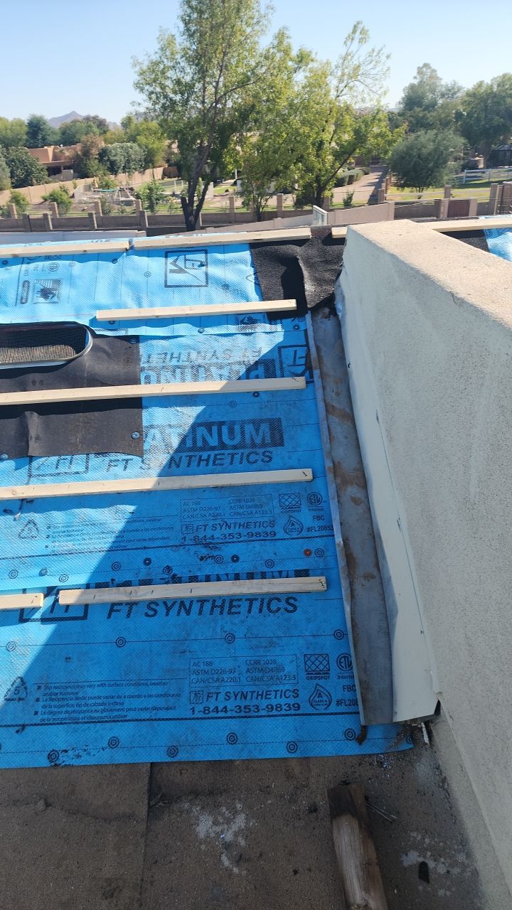 Gray Tile by Reimagine Roofing