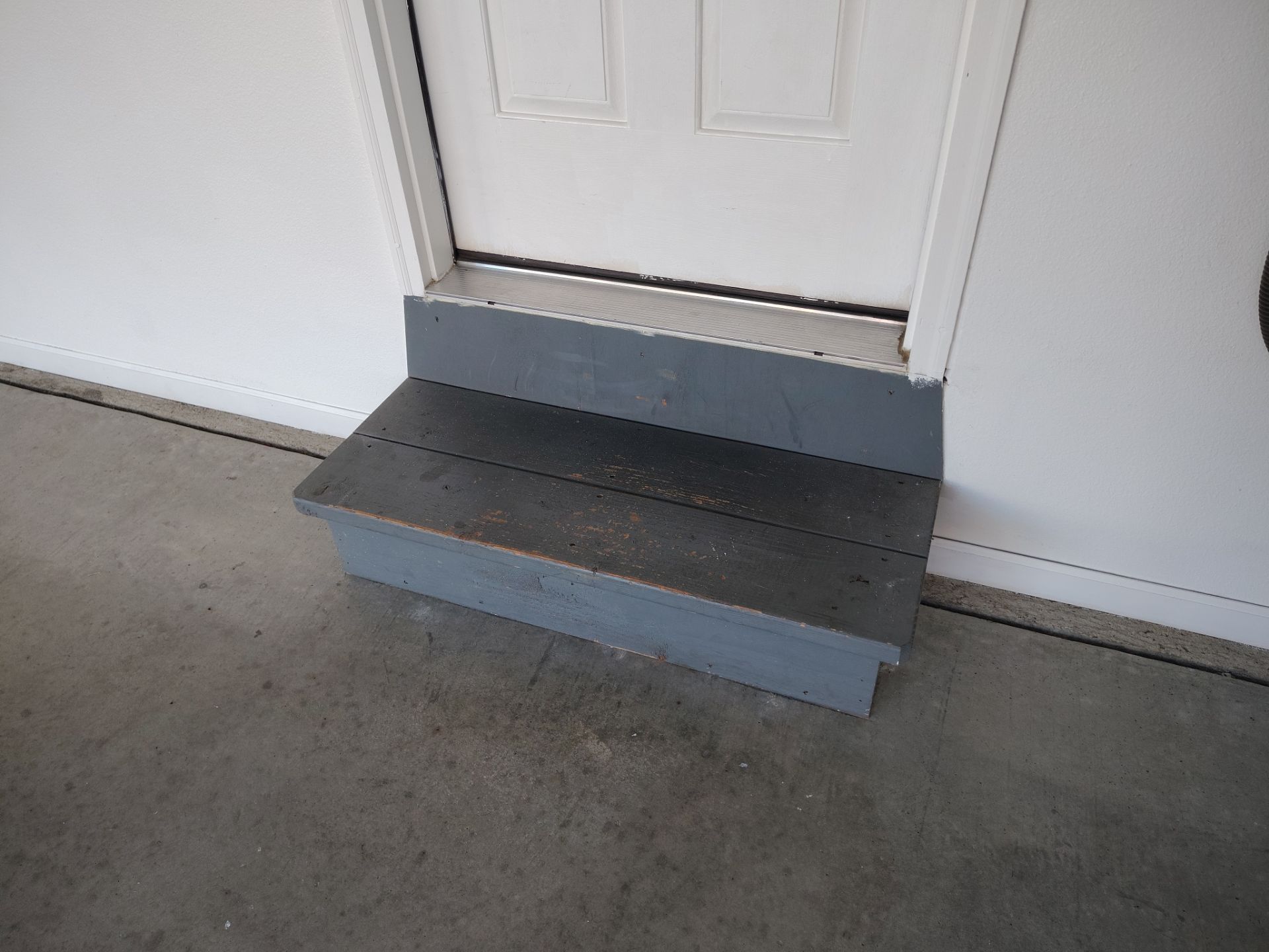 New Johnston Garage Resurfacing by Revival Concrete Coatings, LLC