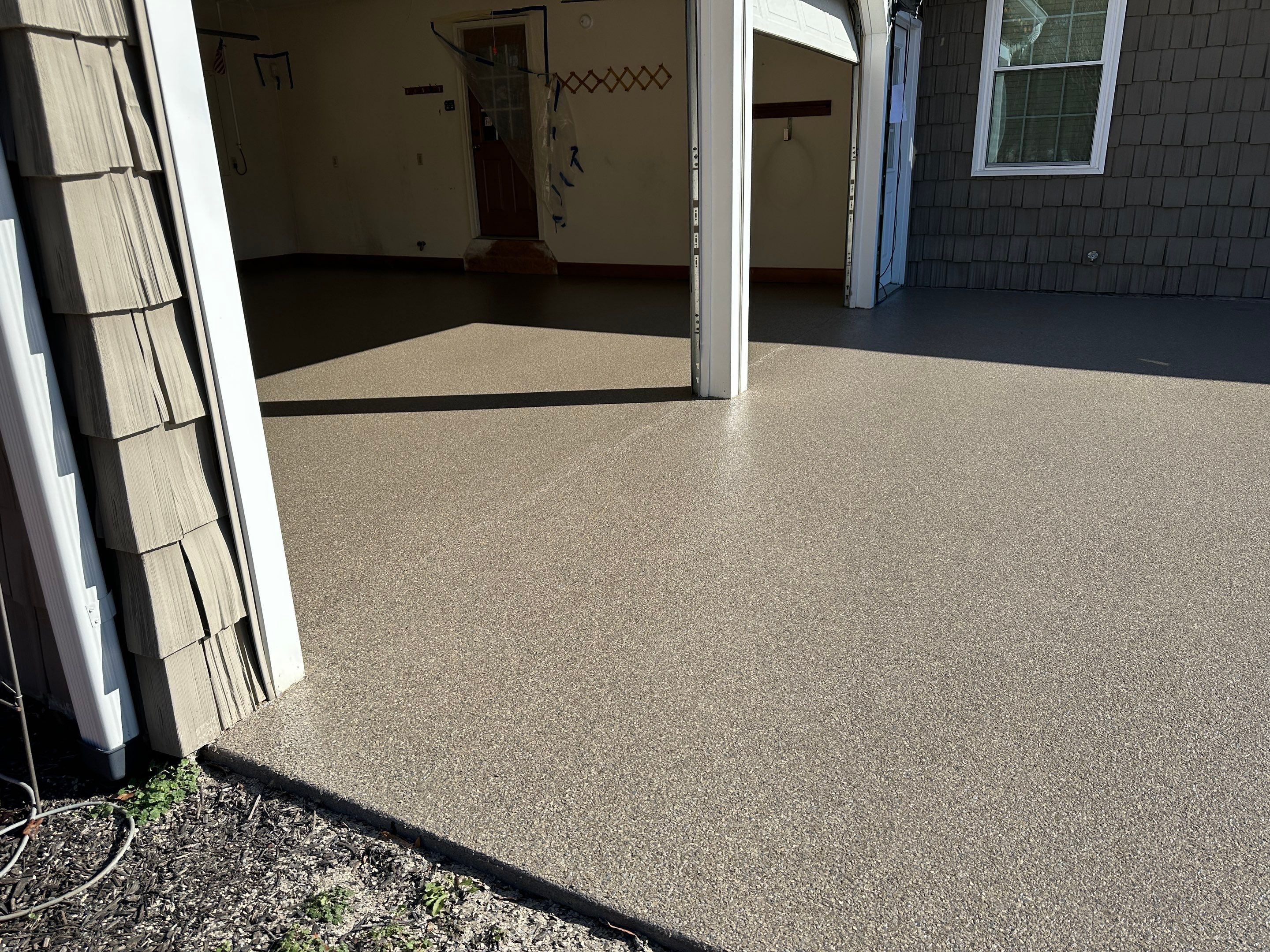 Driveway using Obsidian by Elite Floor Solutions