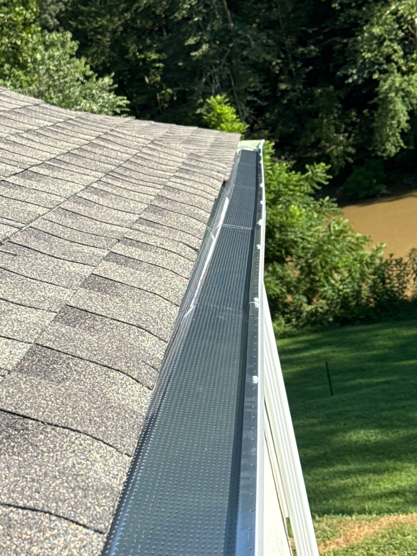 Residential Roofing Installation using GAF Timberline HDZ Weatherer Wood by Rainstoppers Roofing