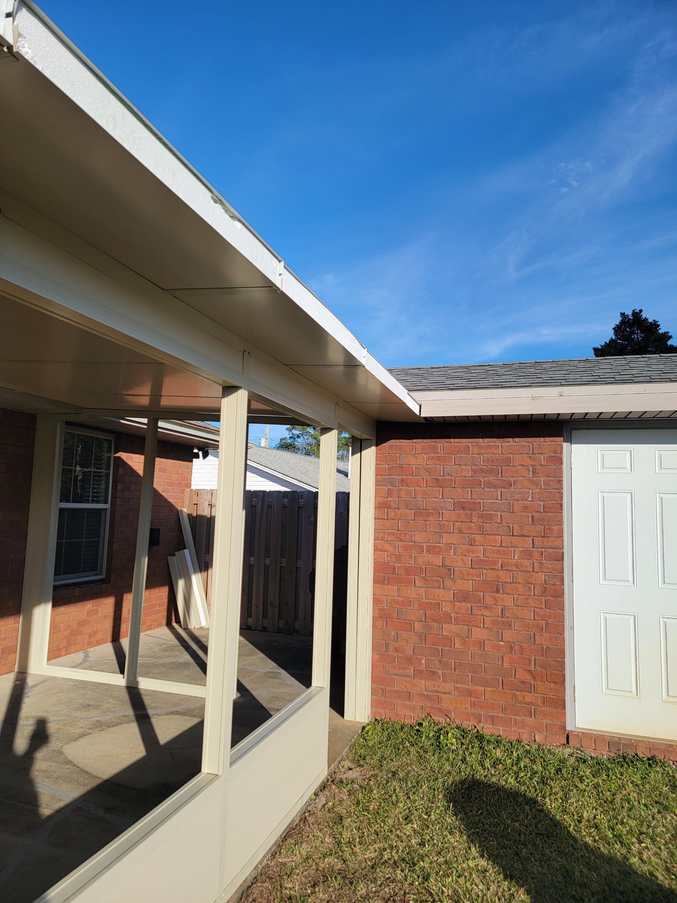 Enclosure w/Vinyl Windows using Colorbeam by Titan Sunrooms