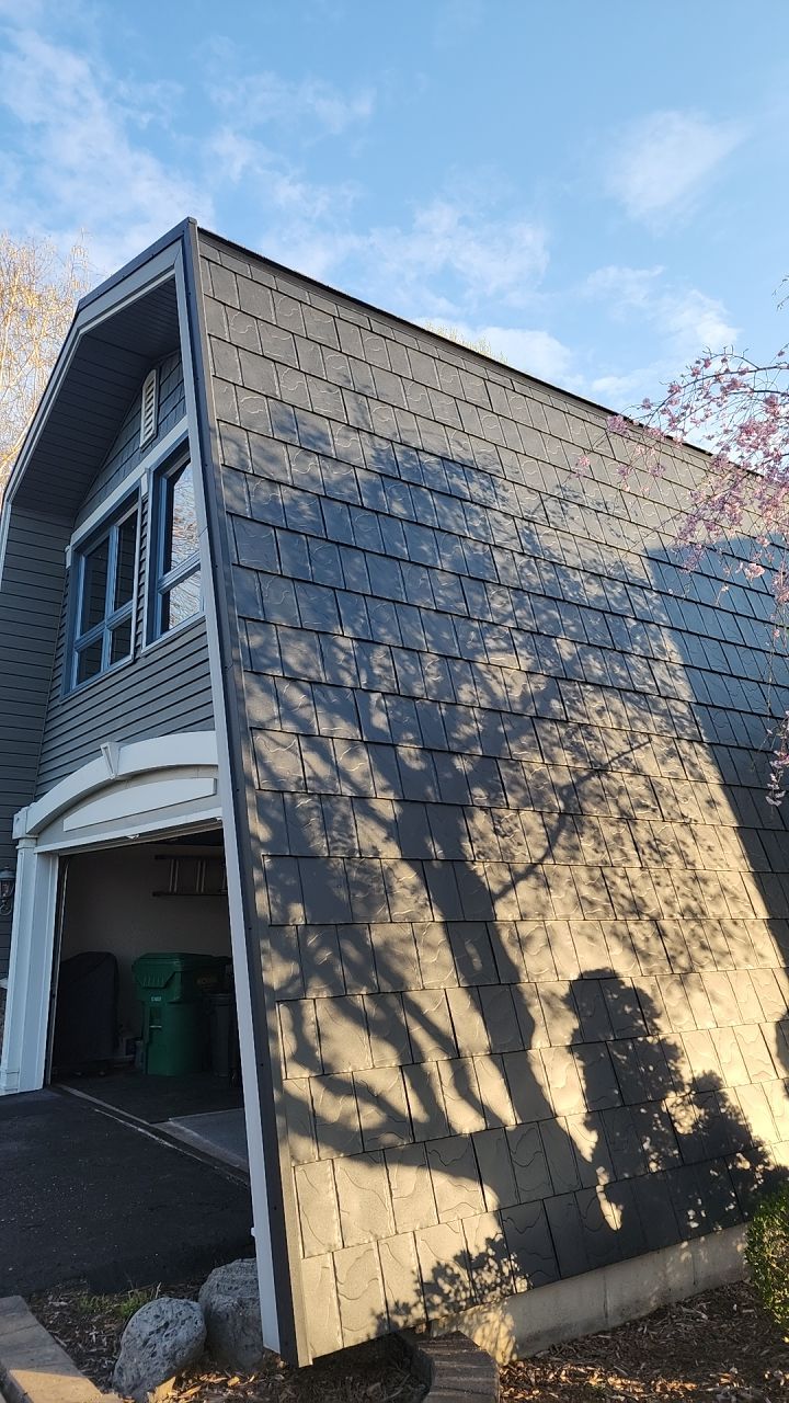 Metal Slate Shingle Roof in Sturgis, Michigan – “Darth Vader Helmet” Home by 4Ever Metal Roofing