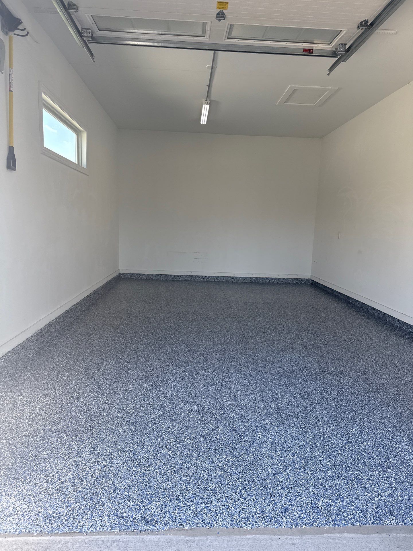 Grimes Garage Floor Coating by Revival Concrete Coatings