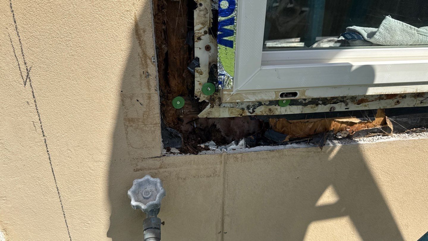 Installing Windows on a Submarine  by Bayfront Roofing and Construction