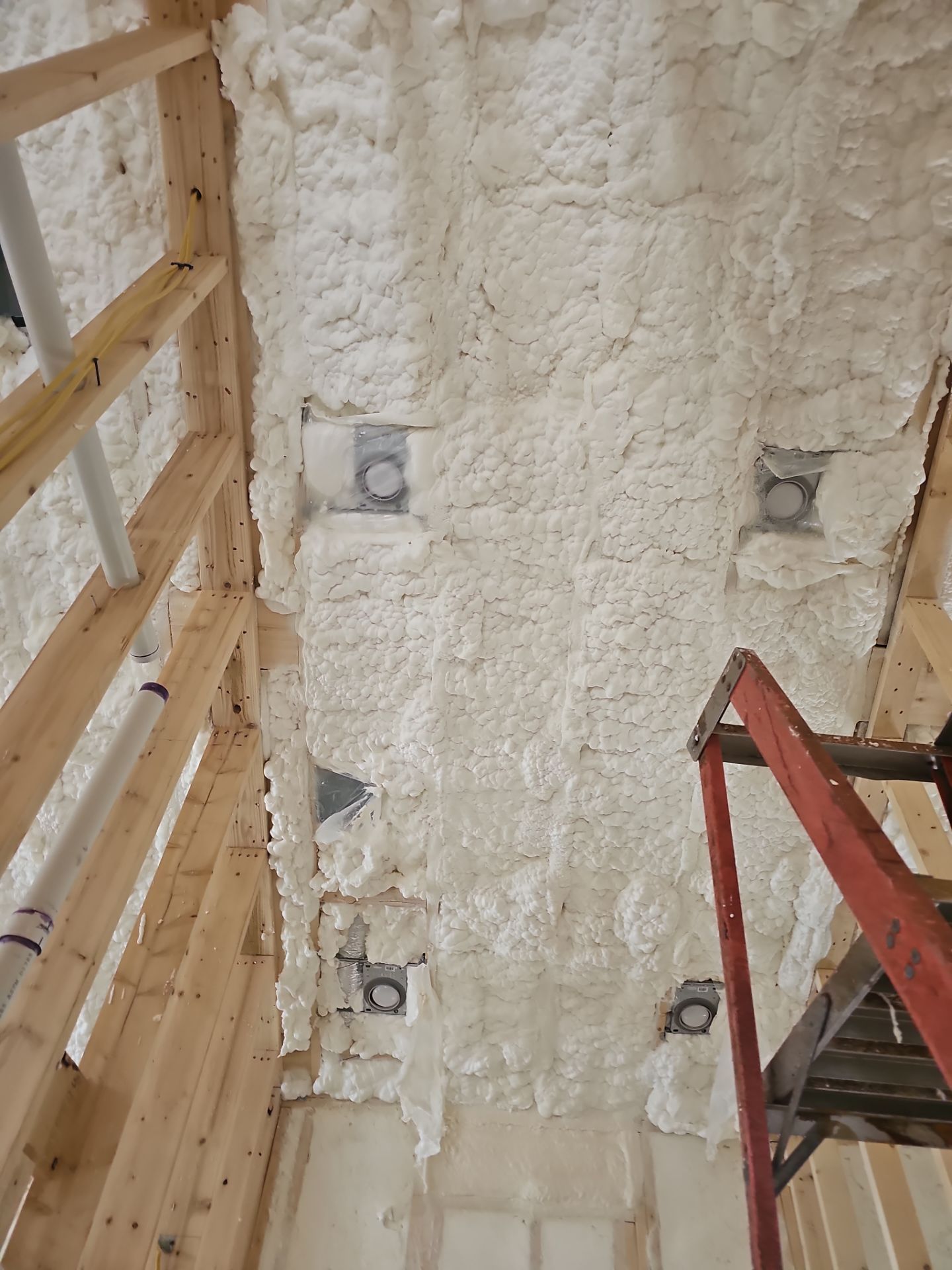 Spray Foam Insulation using open cell spray foam by NYS Foam & Energy