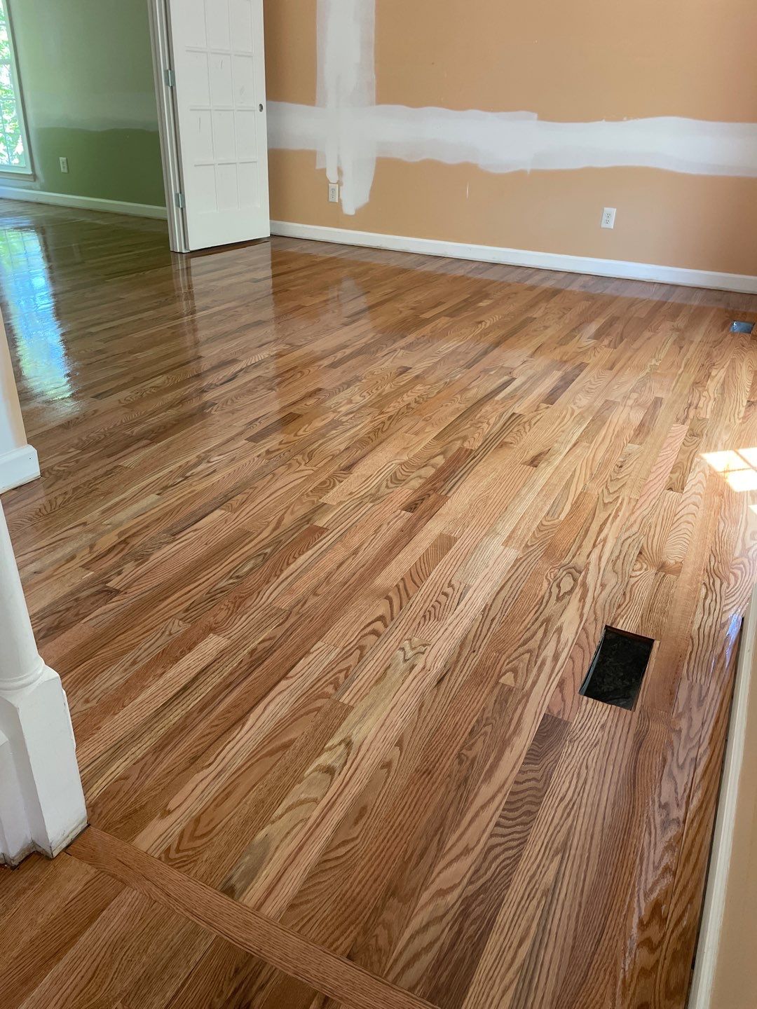 Red oak floor refinishing by Accent Custom Floors