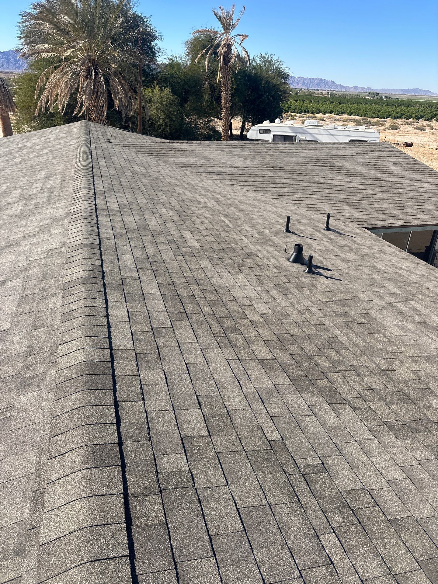 Estate Gray Shingles by Reimagine Roofing