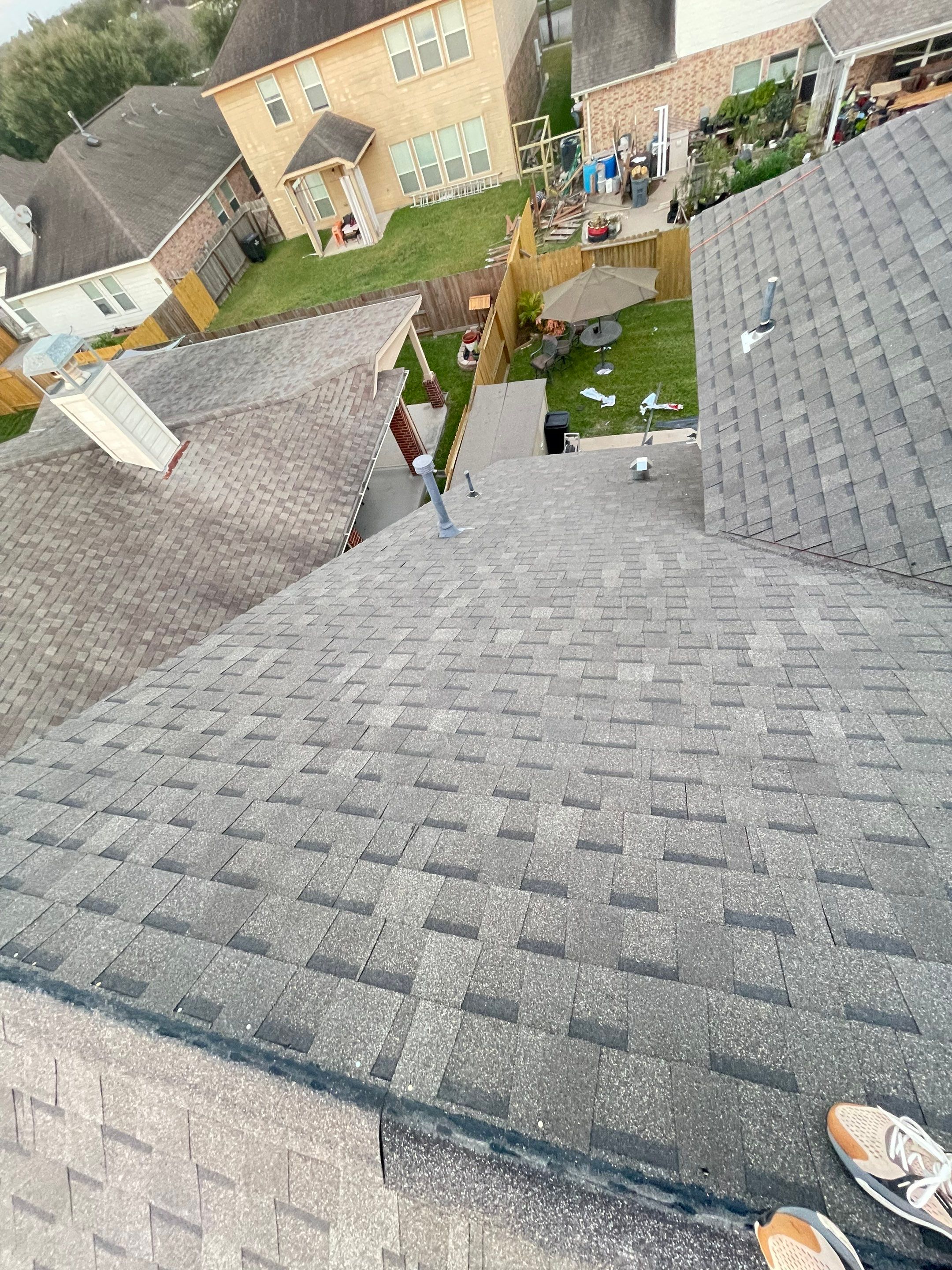 Residential Roofing Installation using Atlas Pinnacle® Pristine Shingles Weatherwood Color by CAP Roofing and Construction LLC