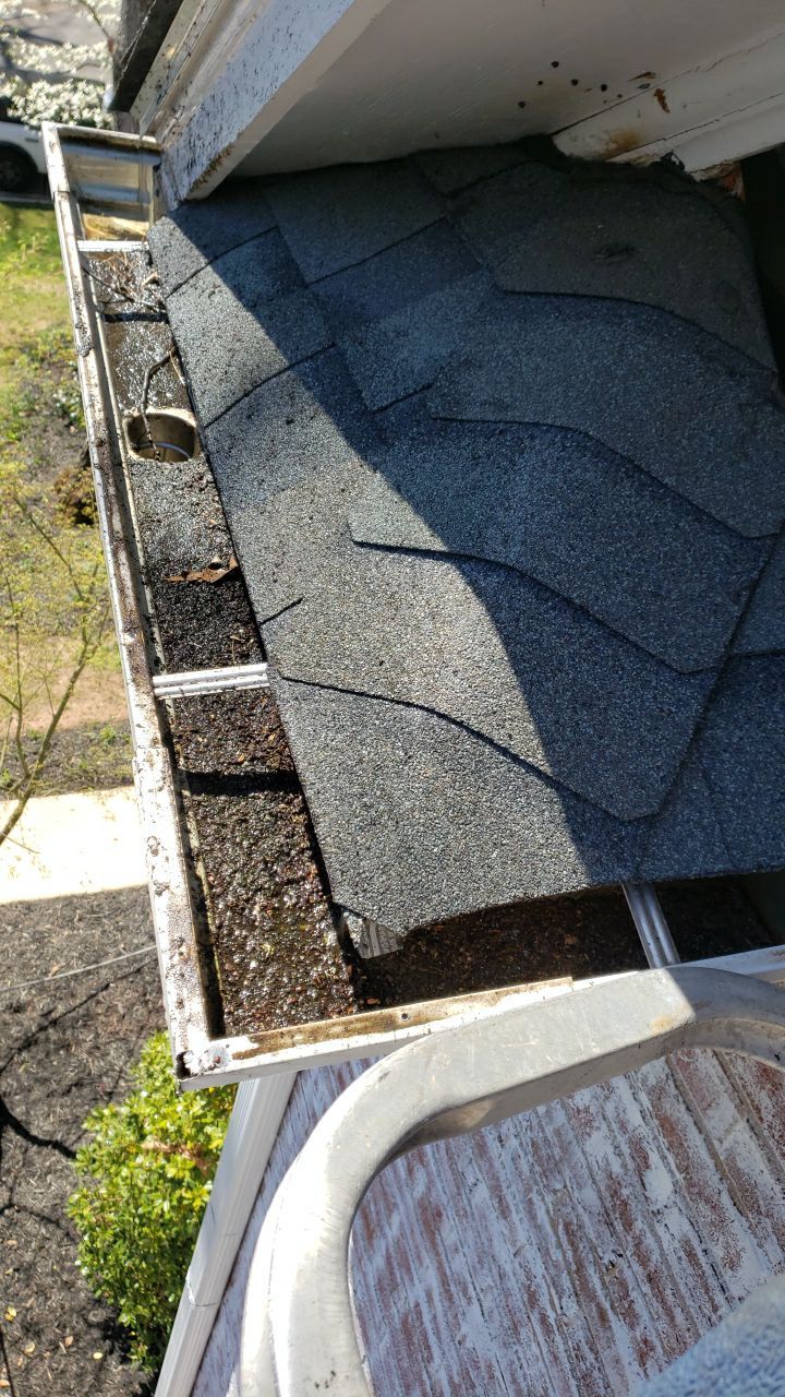 Gutter Cleaning using water by Power Wash Masters LLC