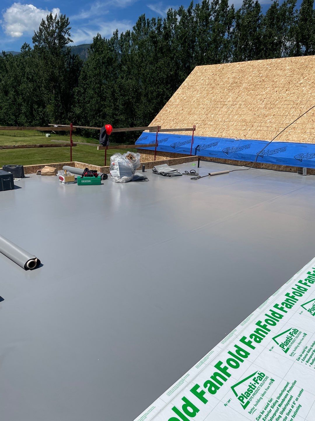 Residential Roofing Installation using multiple products by Top Notch Roofing Inc