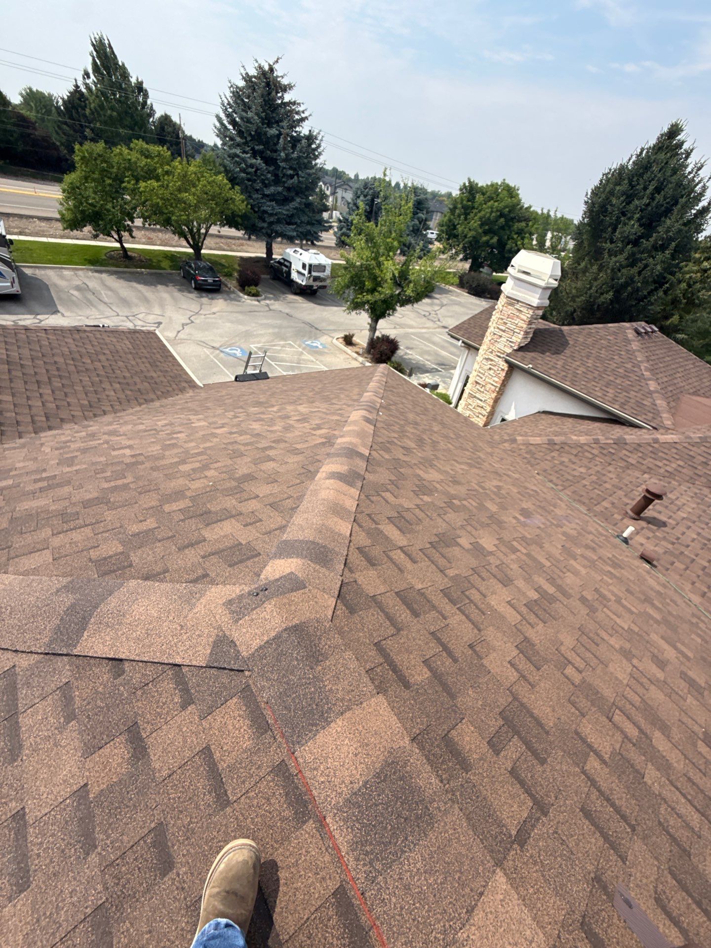 Boise Commercial Roof Replacement with Brown Architectural Shingles by Olive Roofing