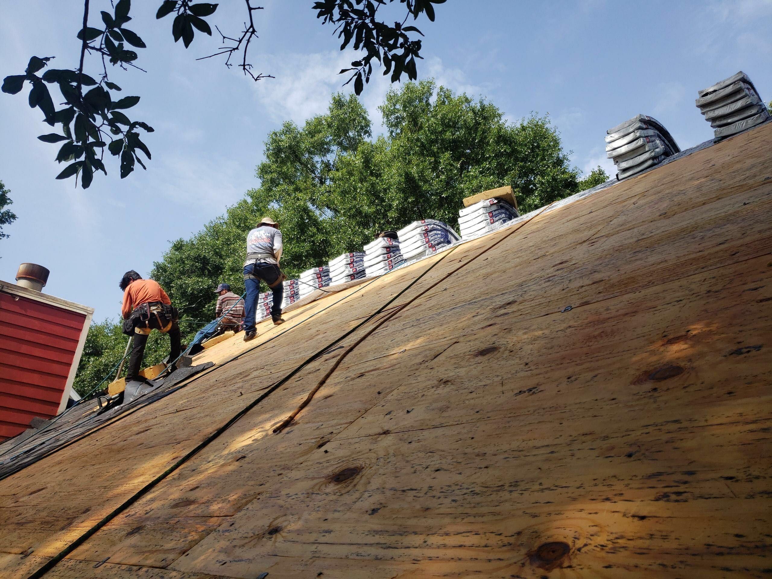 Residential Roofing Installation using Roof Replacement by American Roofing & Construction LLC