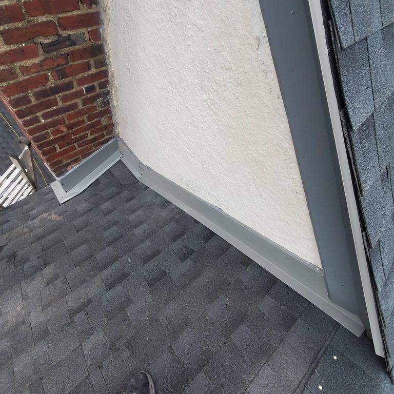 New Roof & Gutters by Island Roofing Inc.