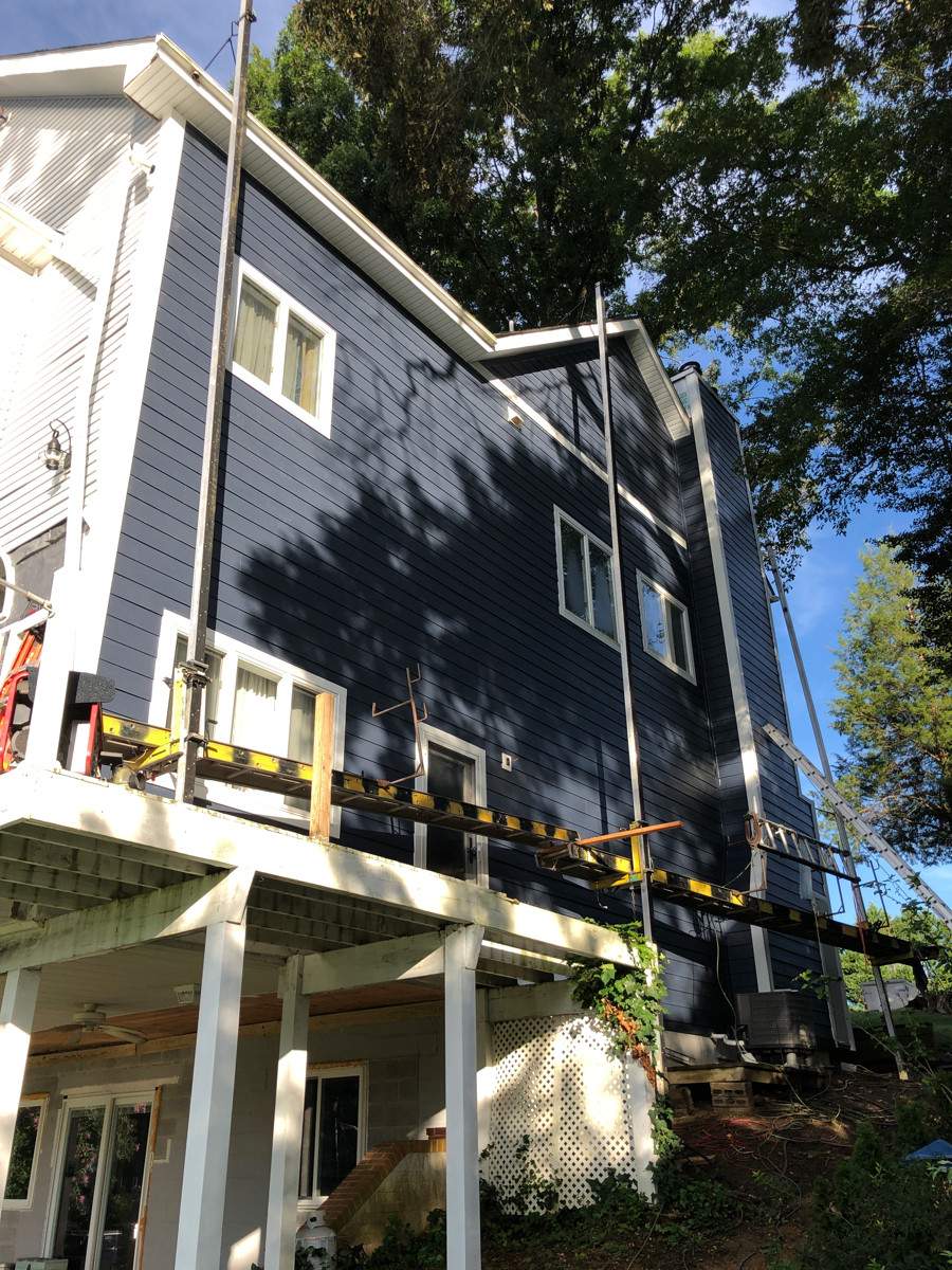 Siding Installation using JH Batten Smooth and JH Cedar Mill Plank by ExteriorPros