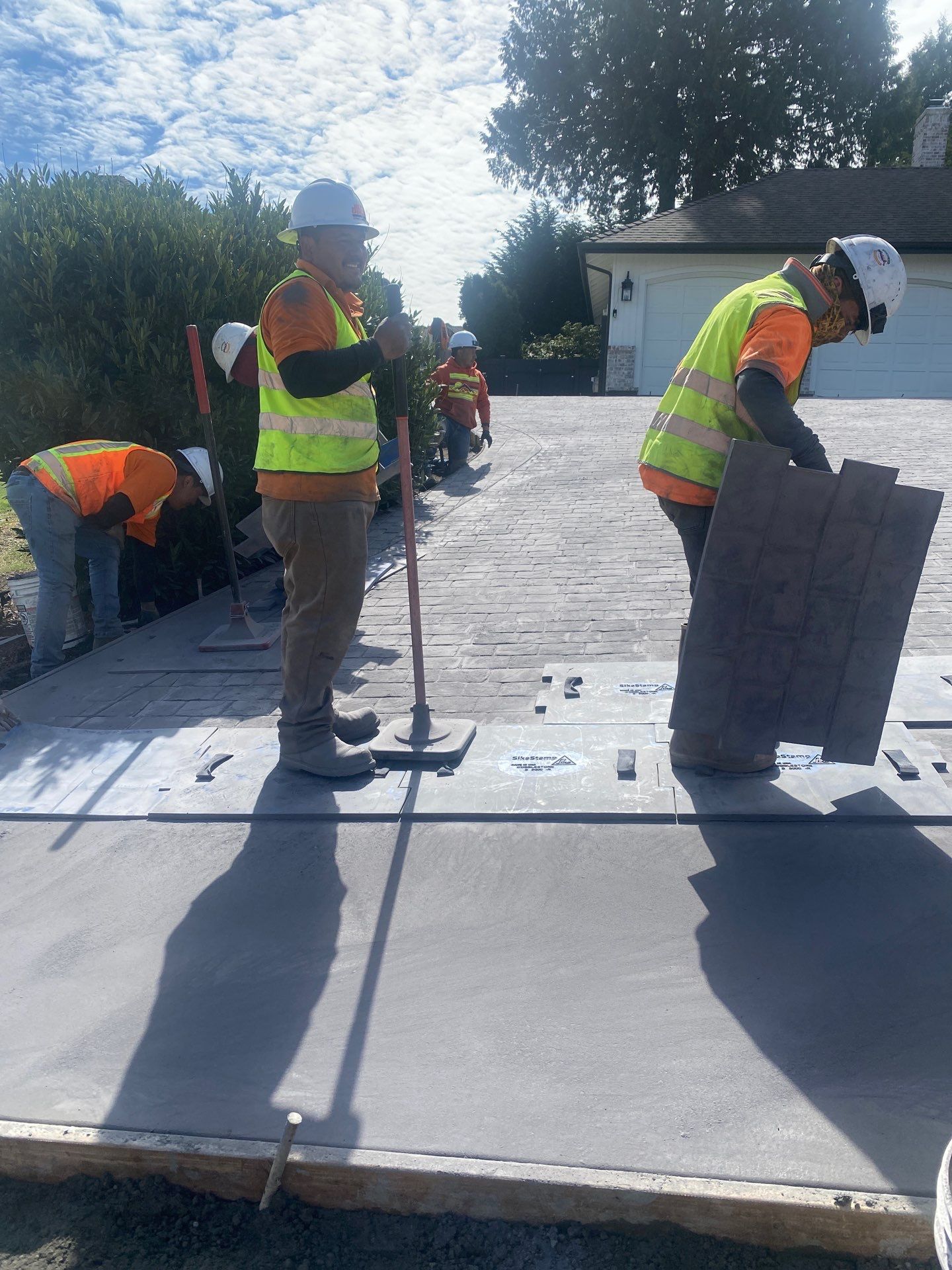 John | Stamped Concrete Driveway Makeover by Jireh Asphalt & Concrete Inc 