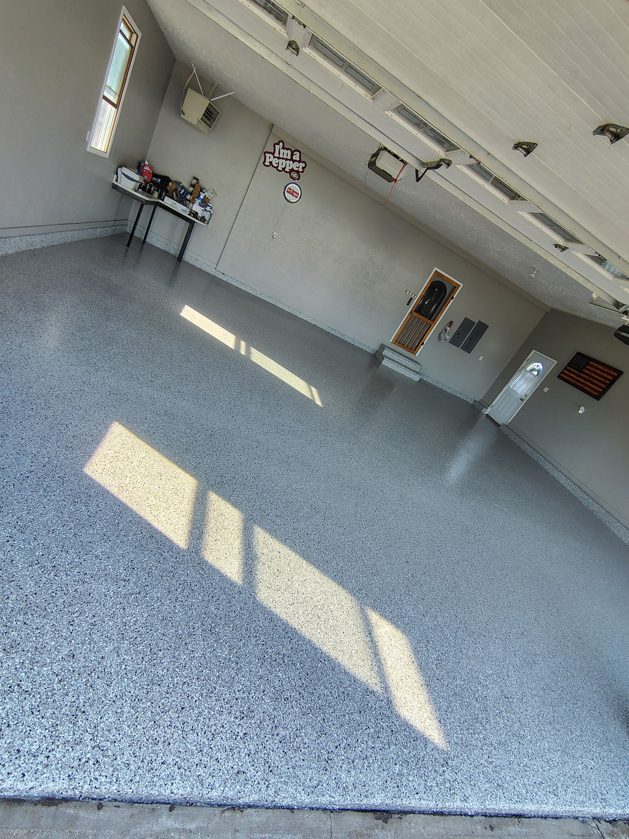 Garage Concrete Floor Coating and Crack Repair in Onawa by Select Painting, Coatings & Garage Cabinets