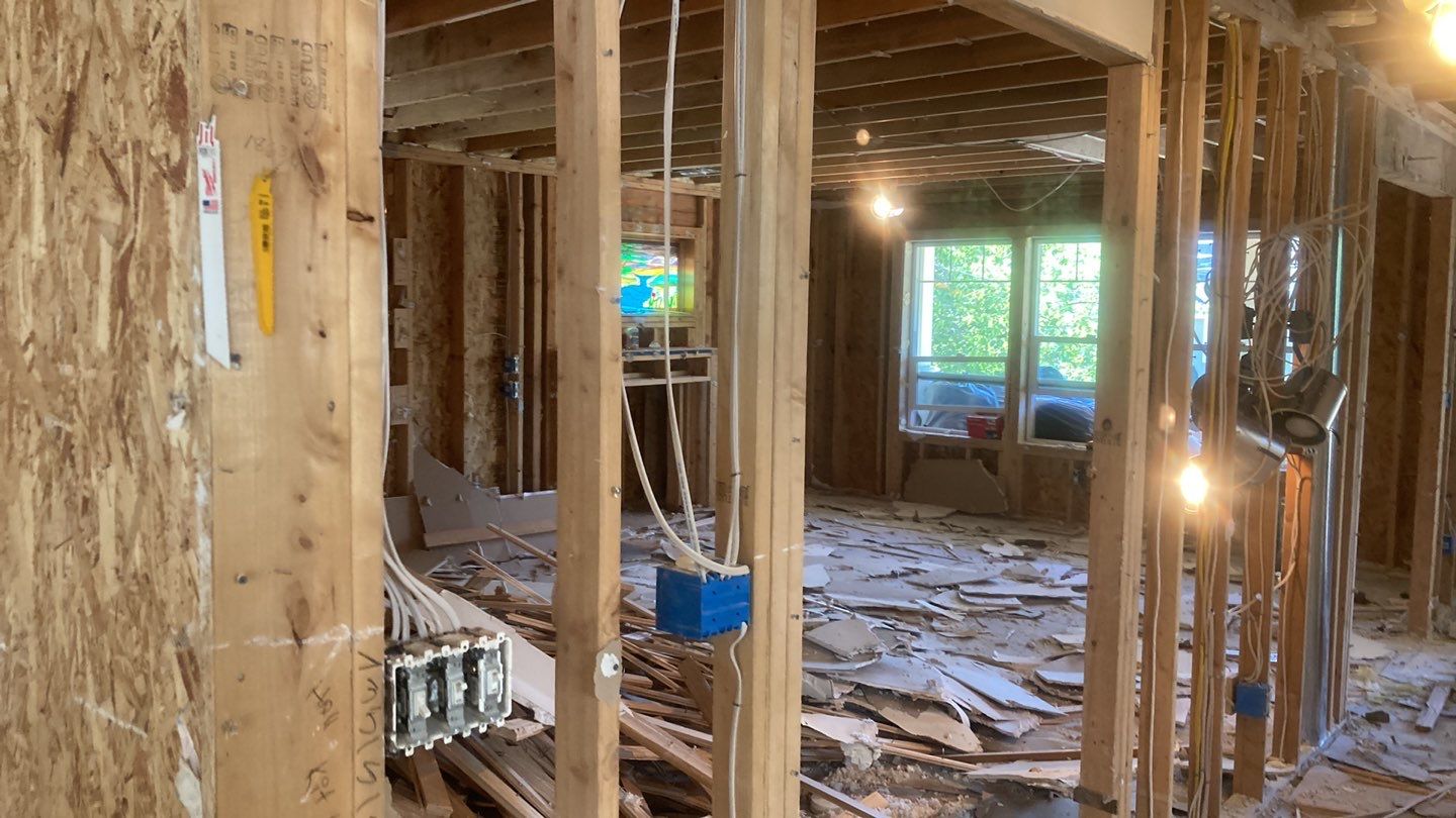 Roof tear-off and interior strip-out by Sledge Seattle