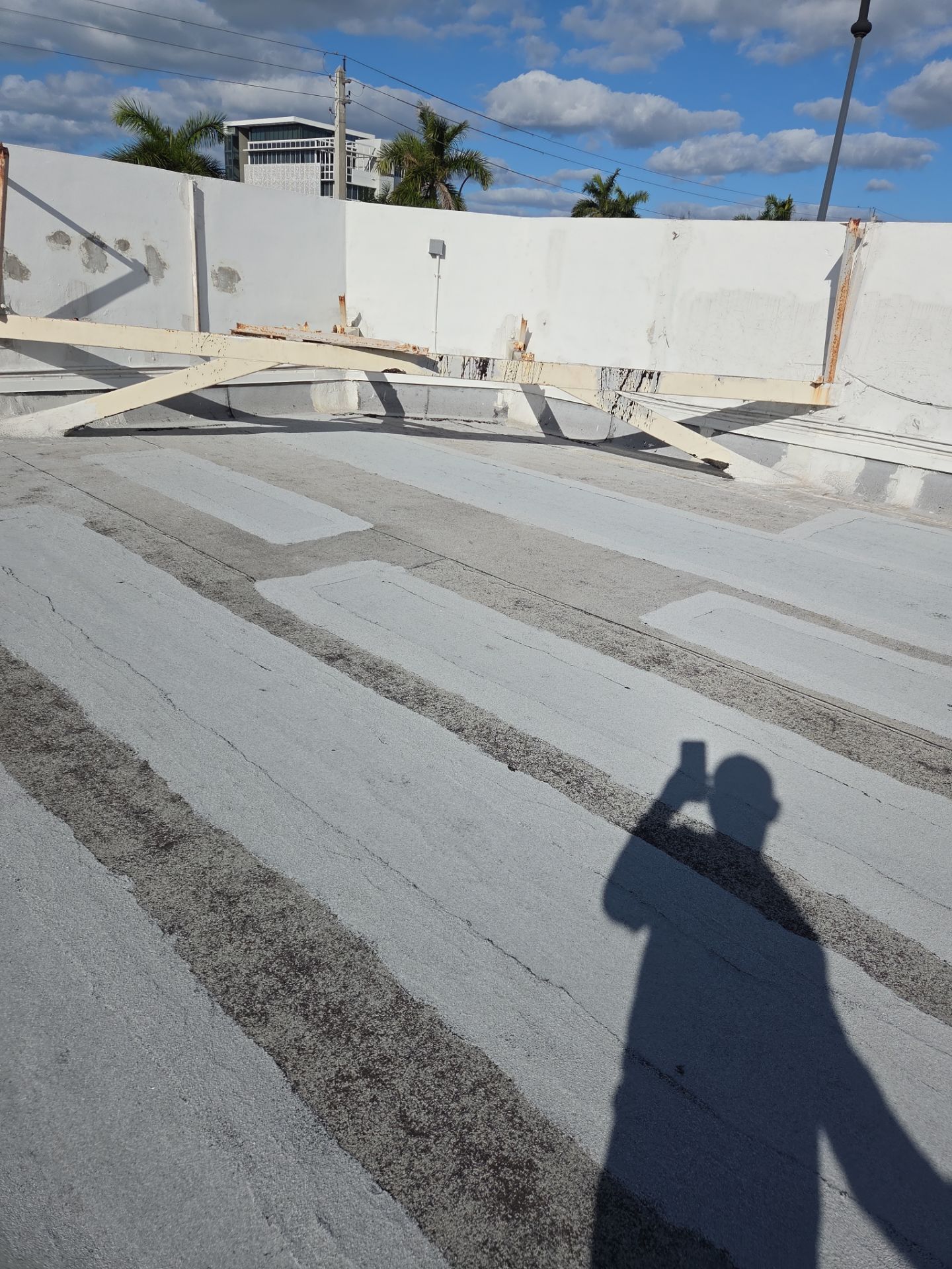 Commercial Flat Roof Restoration Using Silicone Coating in Hallandale Beach by Aastro Roofing