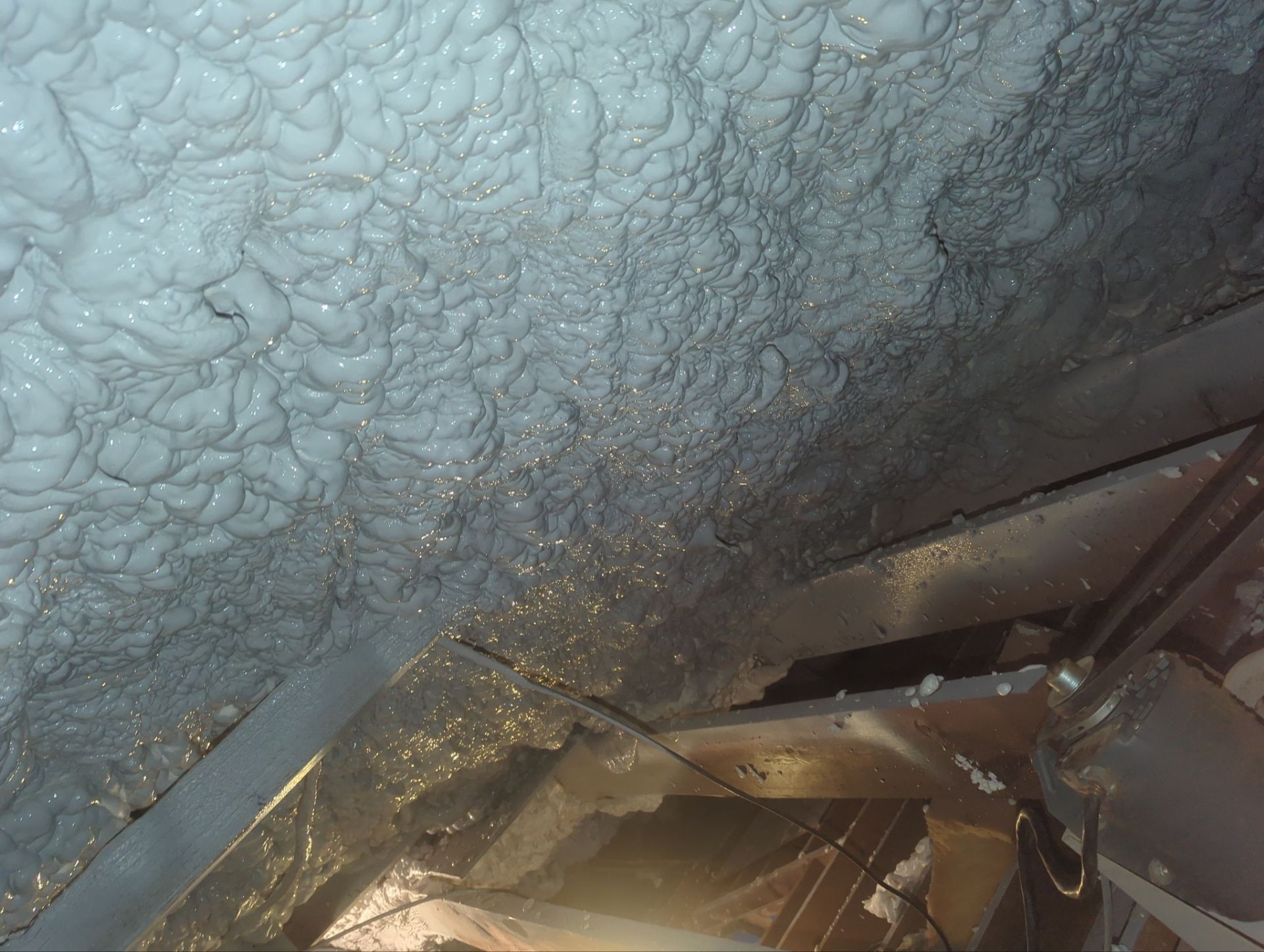 Attic Retrofit using open cell spray foam by NYS Foam & Energy