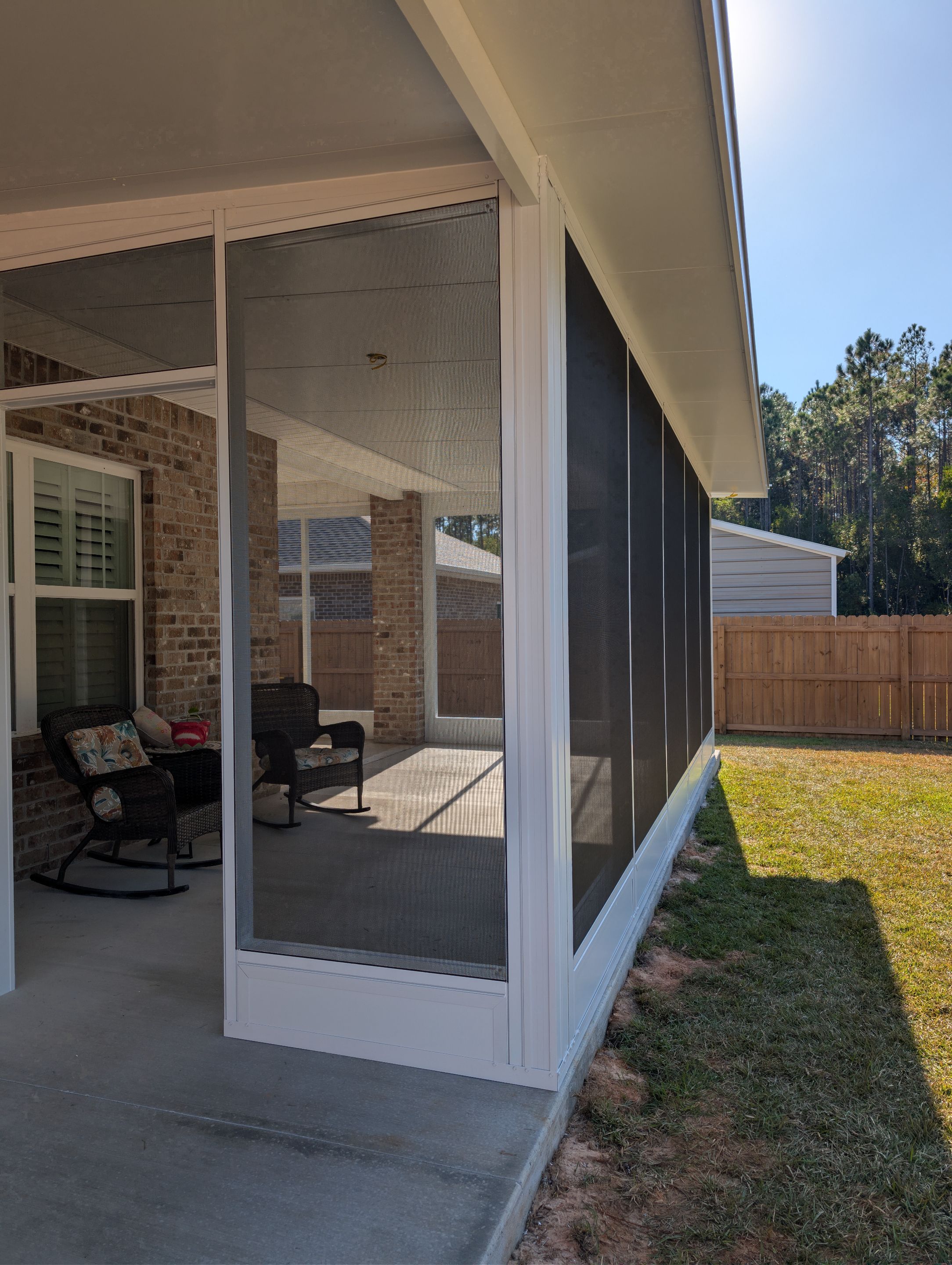 Home addition w/Vinyl 4-Track Windows by Titan Sunrooms