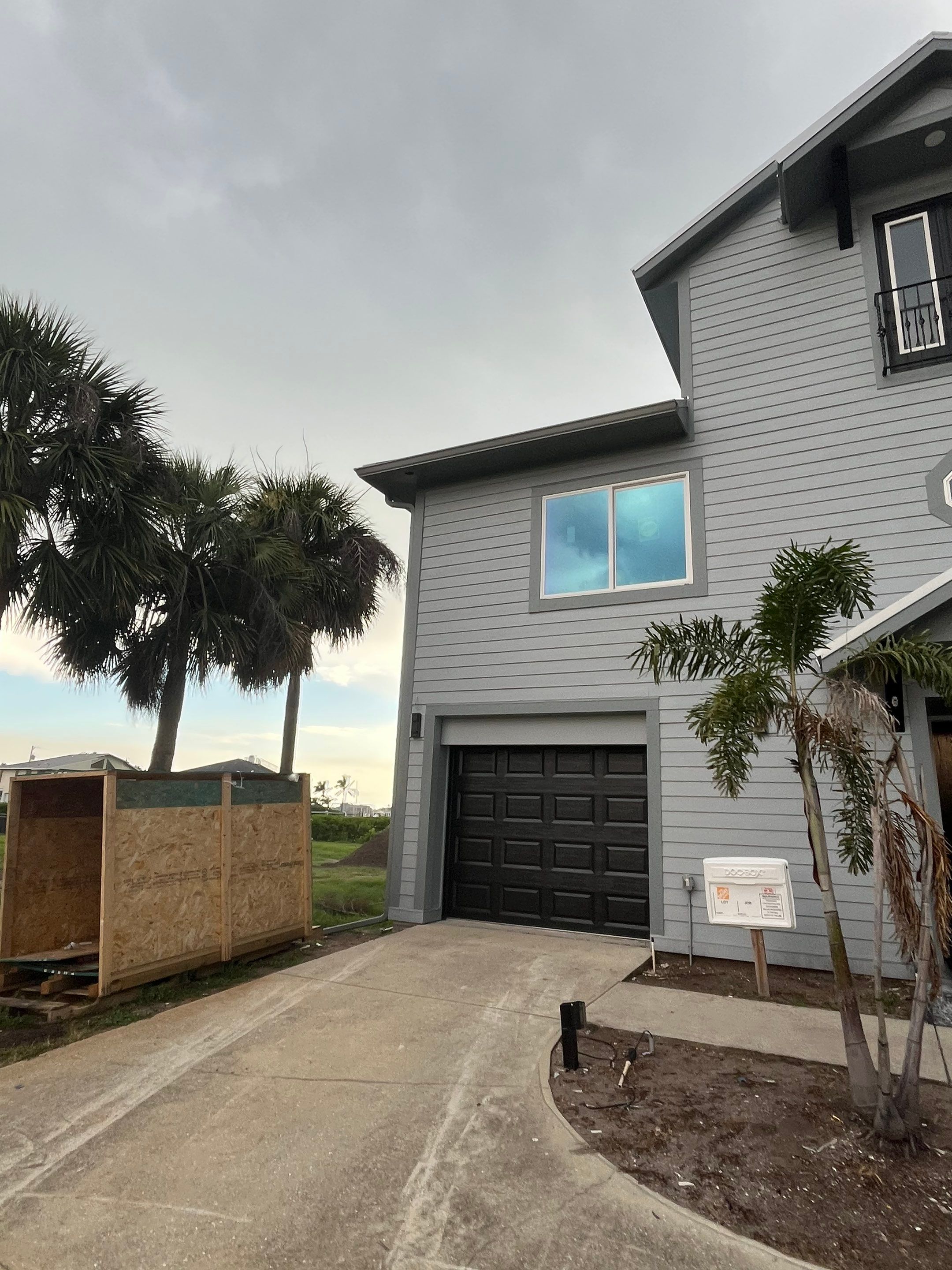 Downspout Installation Dove Grey Palmetto FL by Gutter Professors