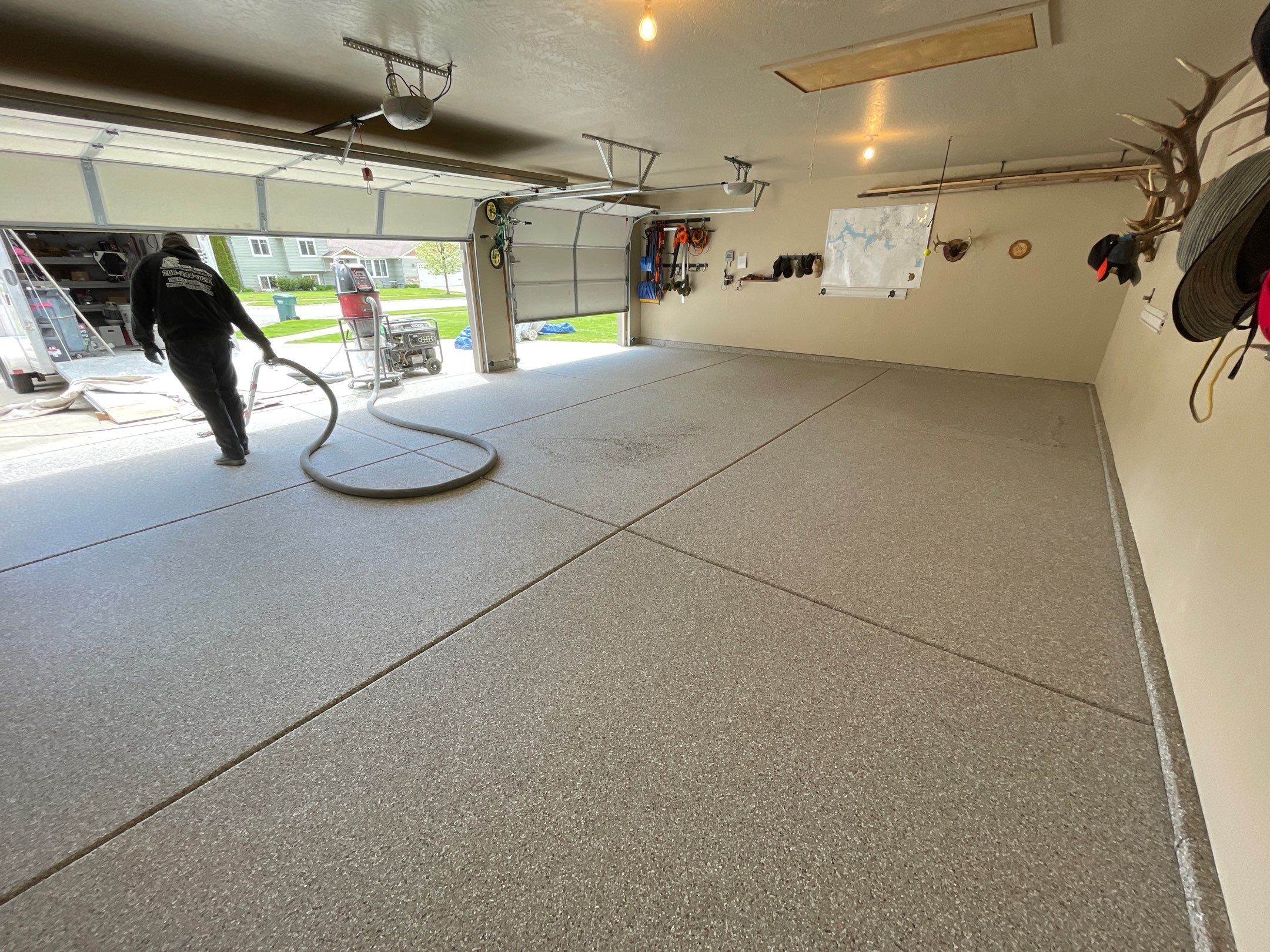 Garage Transformation using Pebble Beach and Front Porch using Greystone by Croc Coatings, LLC