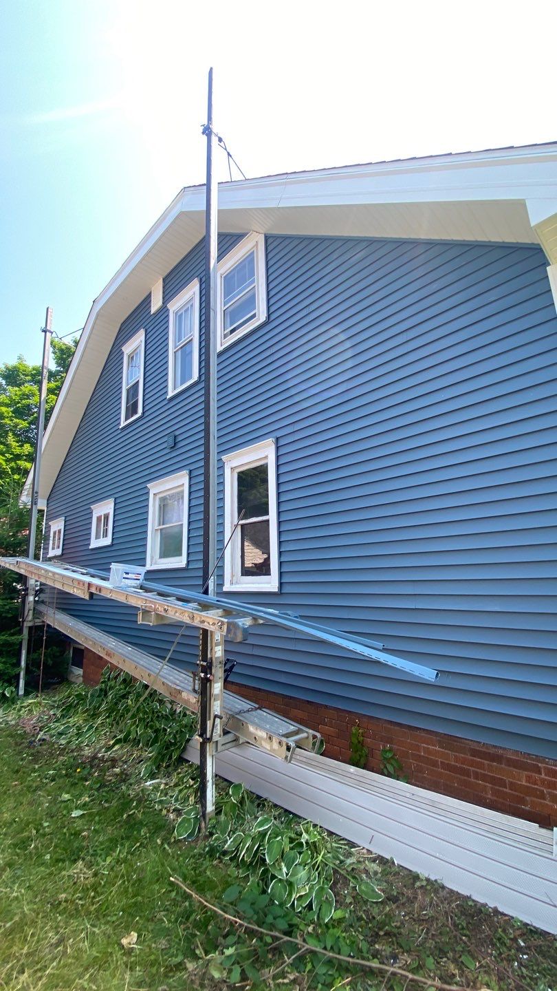 Asphalt Roof, Vinyl Siding, and Aluminum Gutter Replacement by Custom Installations