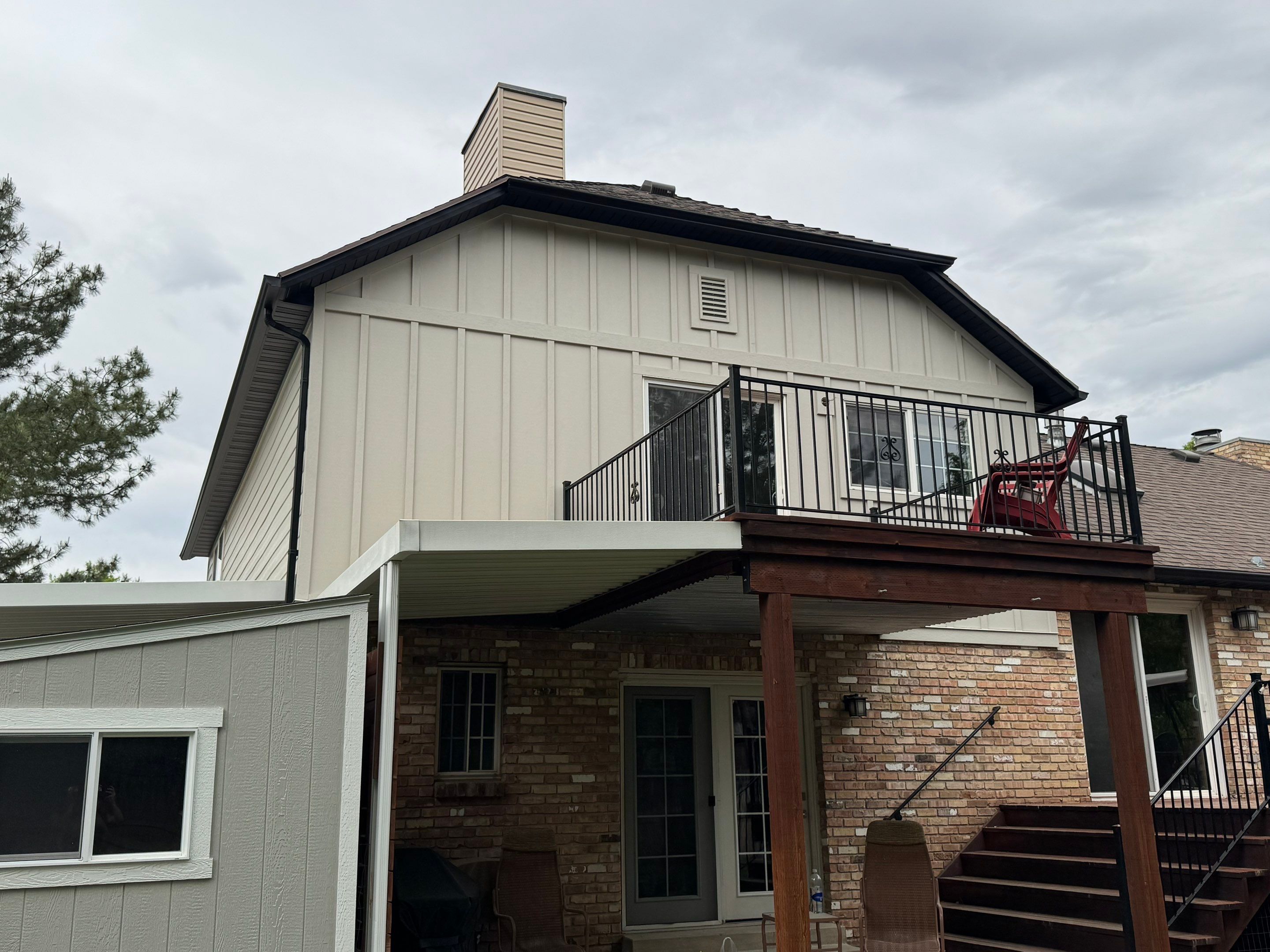 Cottonwood Heights | Custom Hardie Exterior & Bold Fascia | Cobble Stone Accents by Ideal Siding Utah