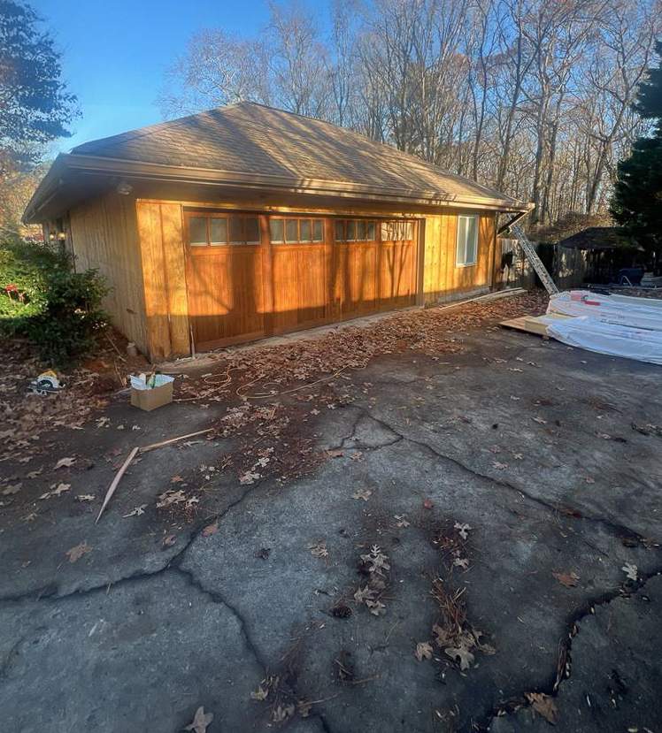 Siding, Gutter, and Replacement with Exterior Painting on 1974 Built Home in Roswell, GA by Nelson Exteriors 