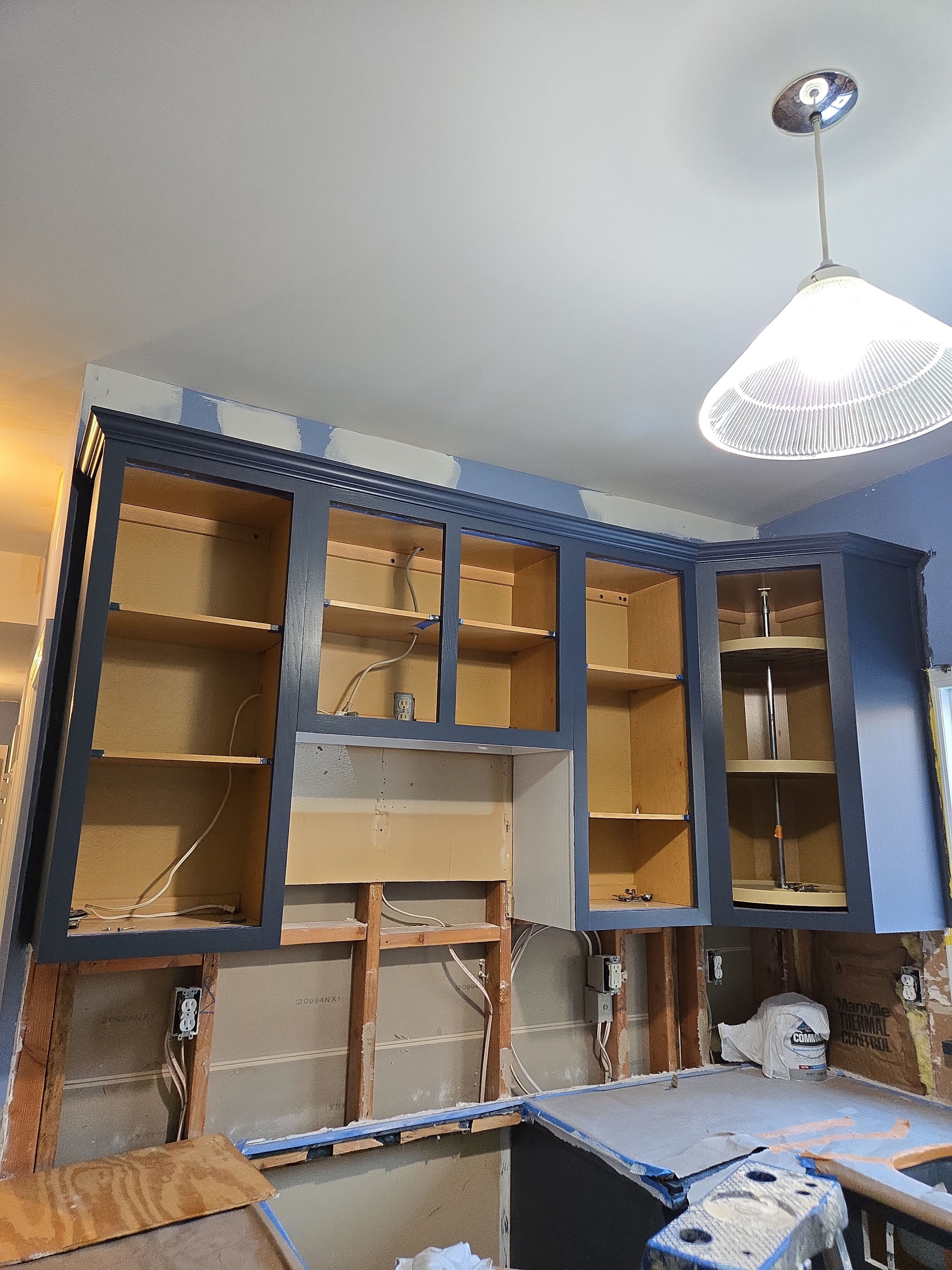Cabinet Refinishing using Benjamin Moore Command by Spectrum Painting, LLC