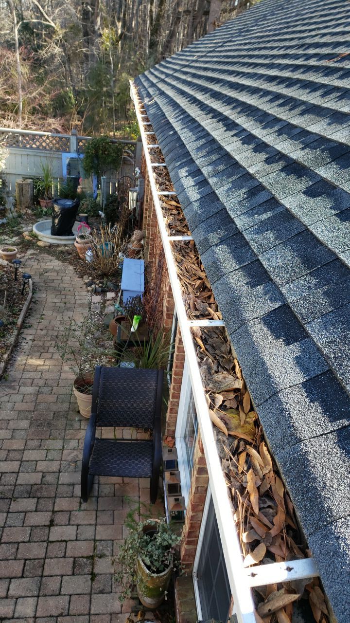 Gutter Cleaning using water by Power Wash Masters LLC