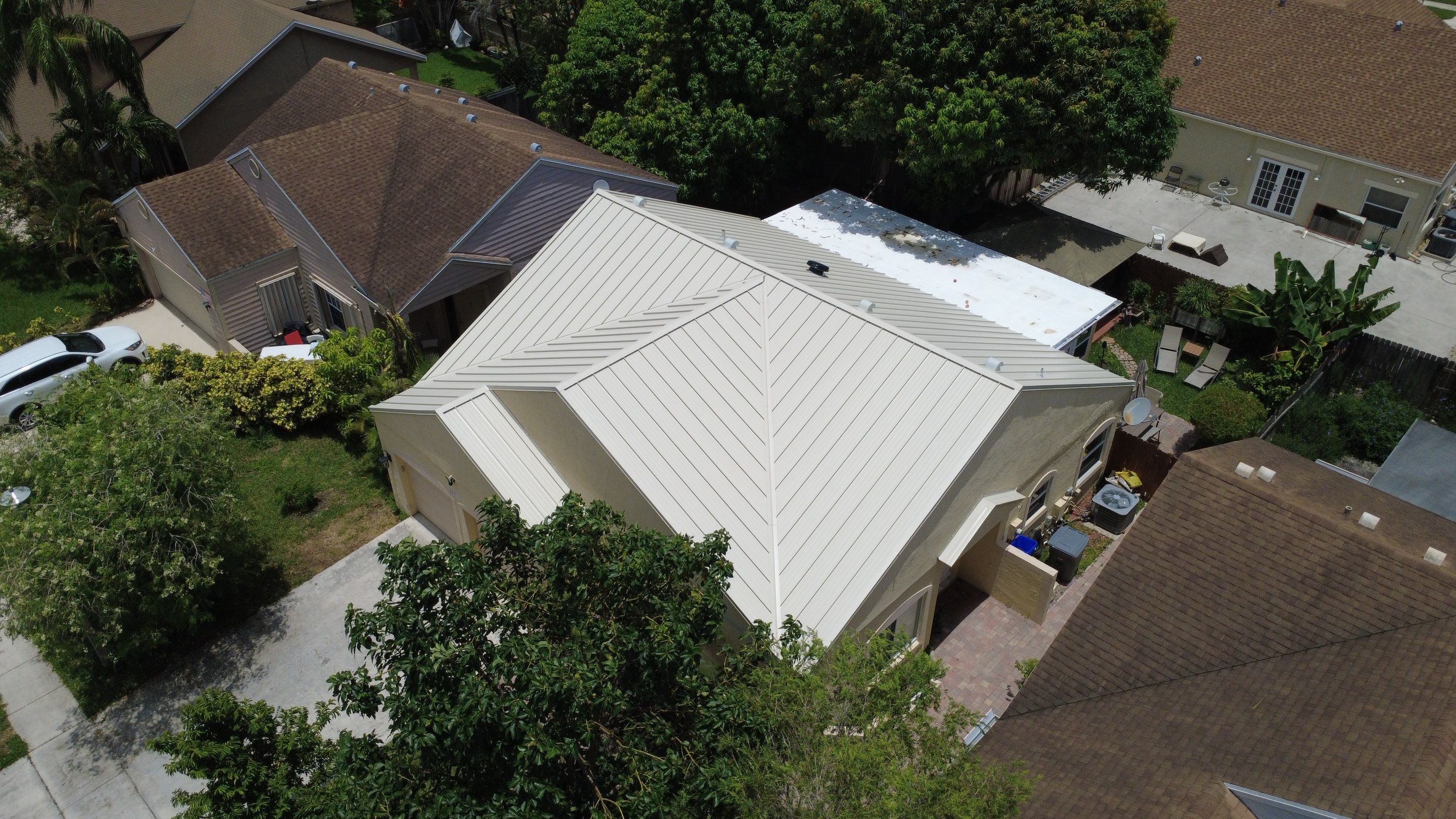 Residential Roofing Installation using 1.5'' Mechanical Seam by BLUES BROTHERS ROOFING