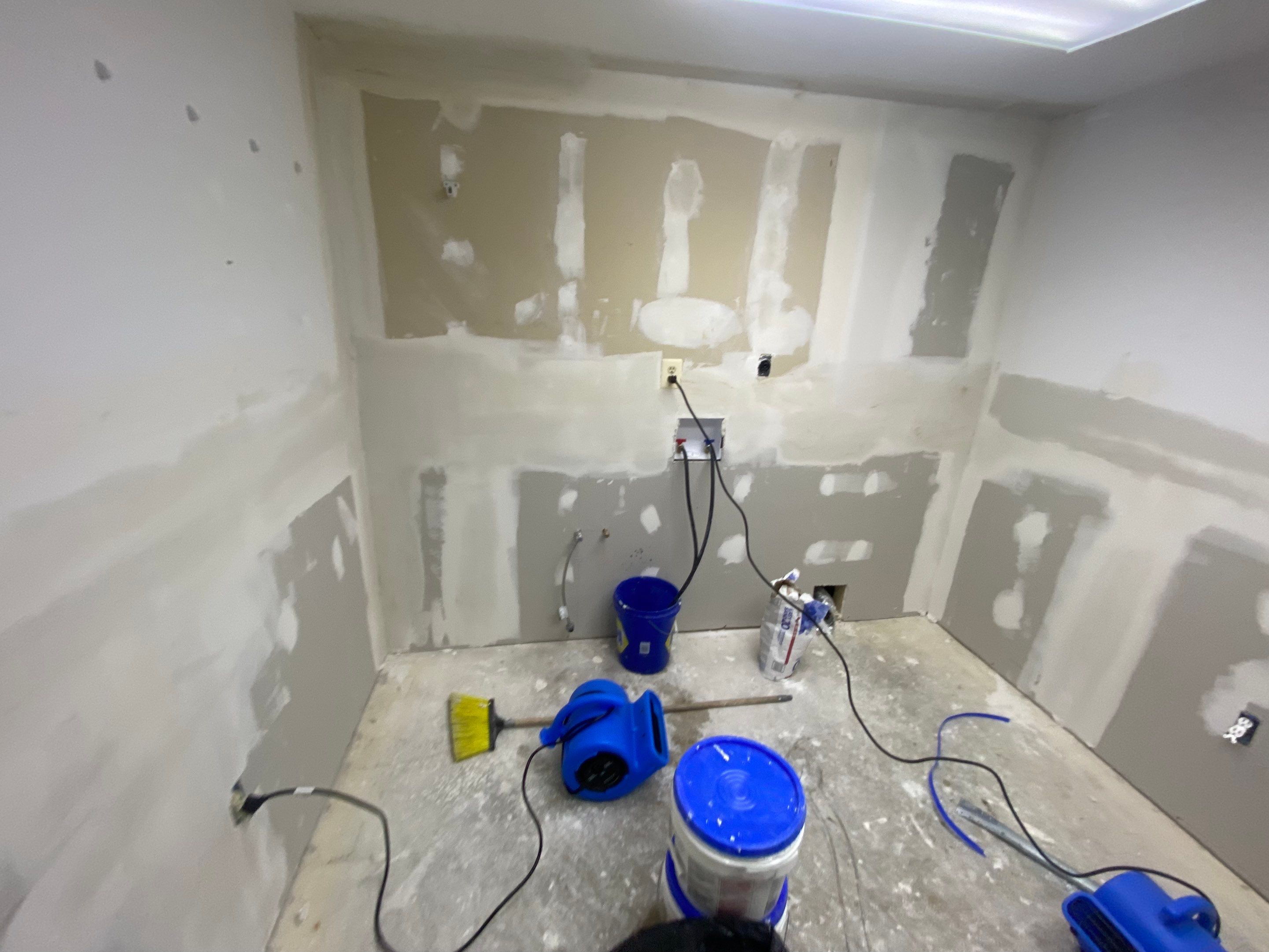 Laundry Room Redmodel using Lifeproof Luxury Vinyl Plank Flooring by The Smet Companies, LLC