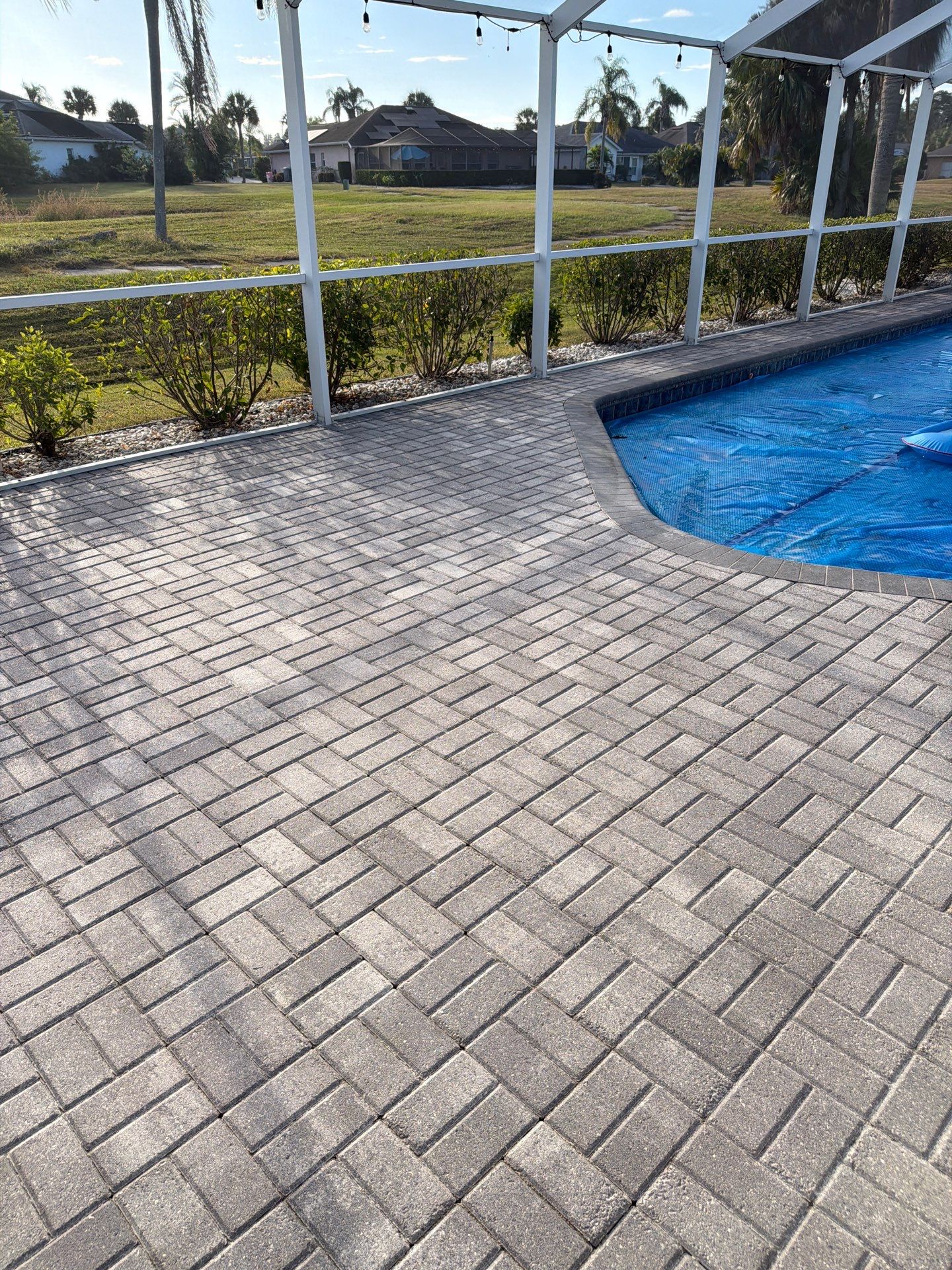 Paver Sealing for Screened Pool Deck in Sun City Center by Supreme Paver Experts