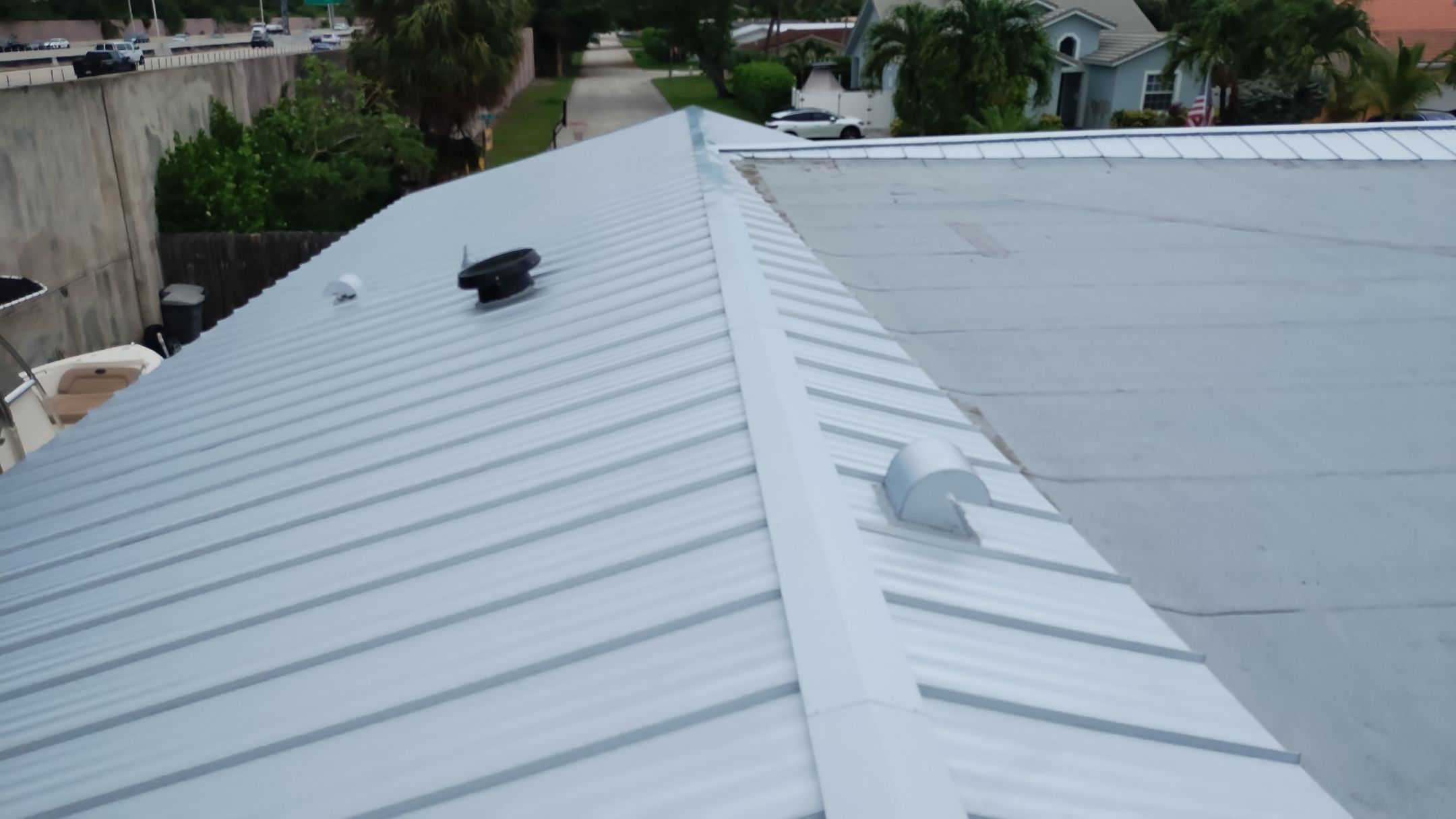 Residential Roofing Installation using 1" Nail strip metal roof by BLUES BROTHERS CONSTRUCTION CORP