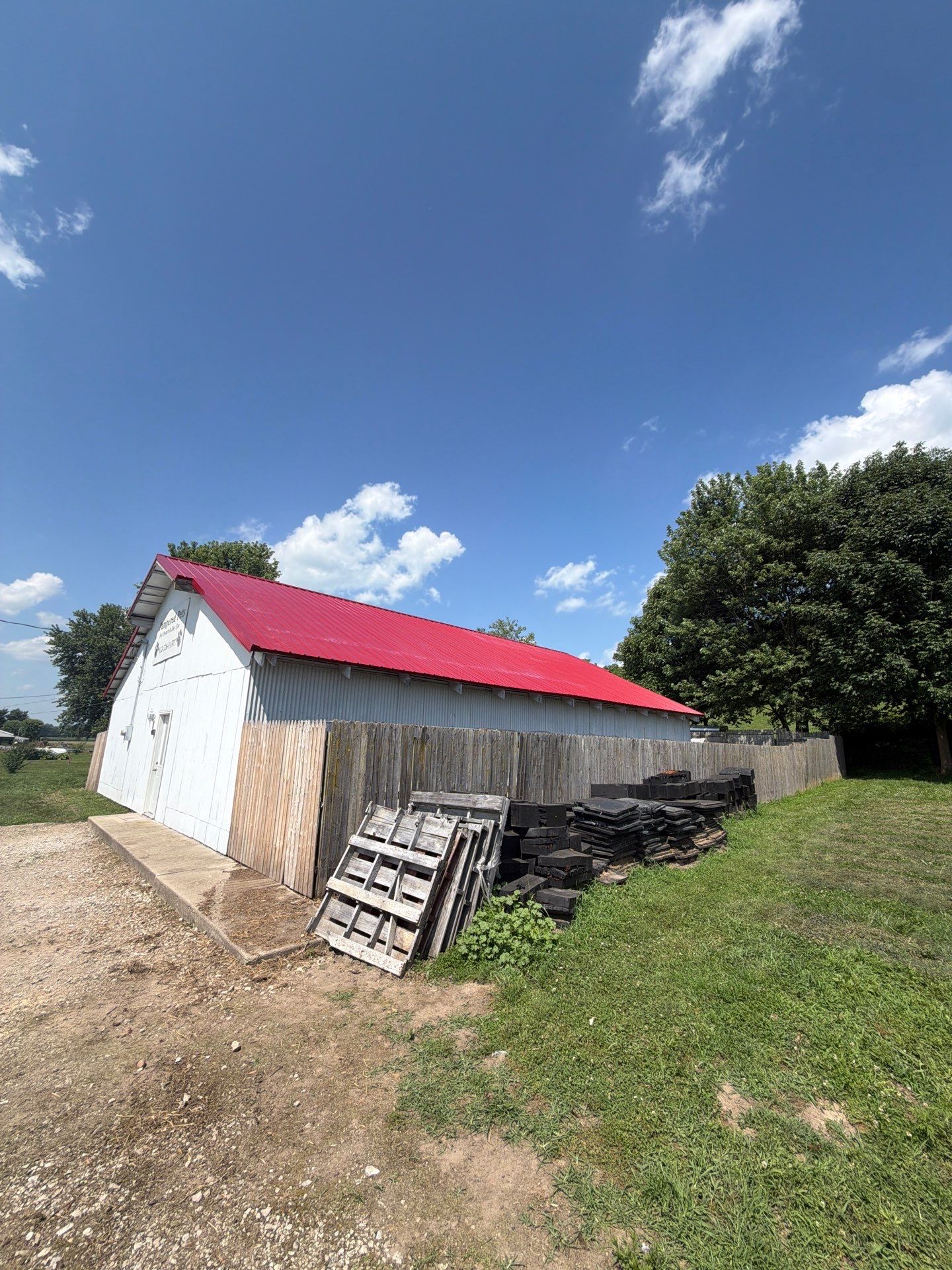Classic Rib Metal Roofing - Dark Red by Hoel Roofing & Remodeling