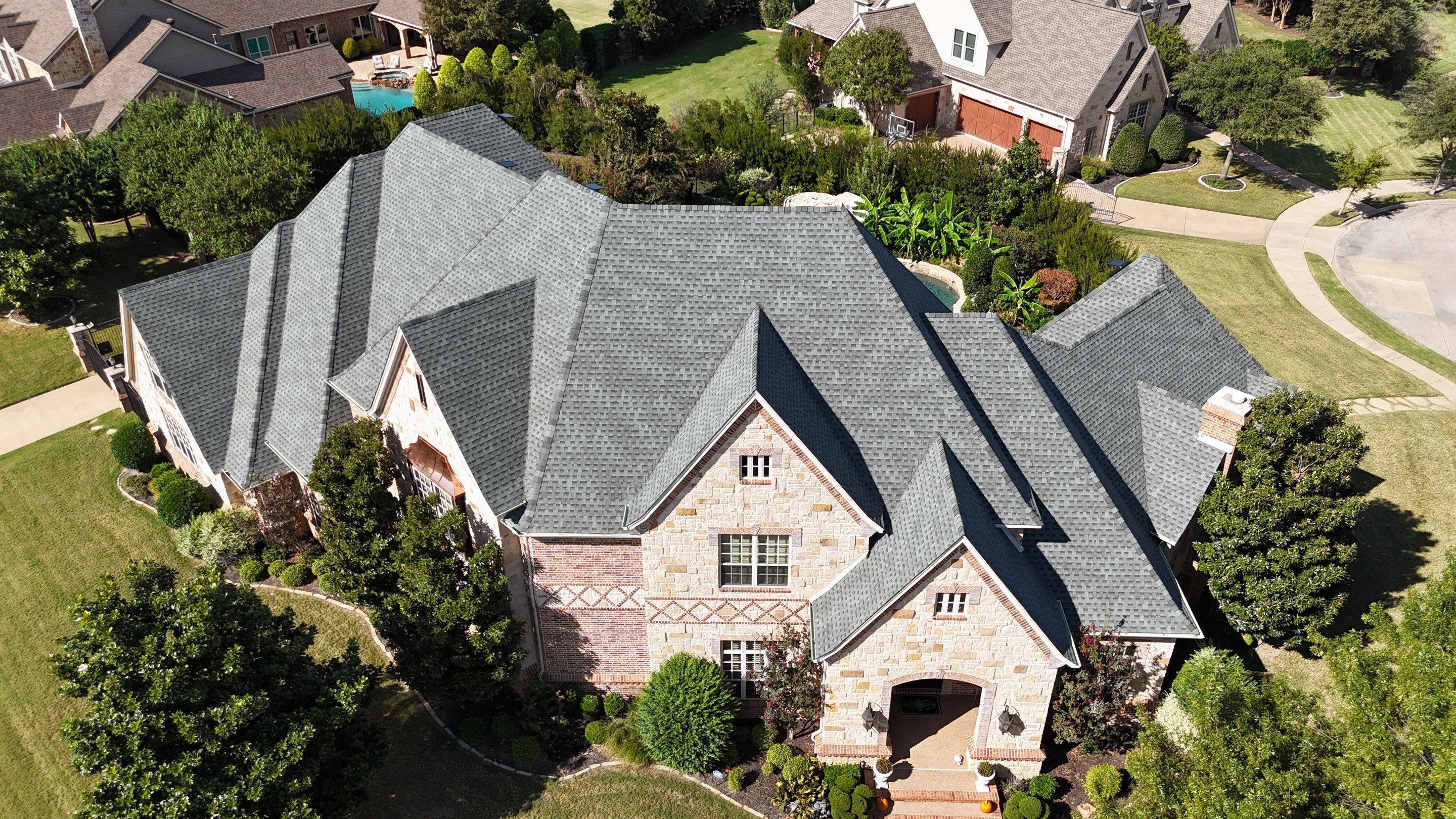 Southlake Texas Estate - Roof, Copper Awning and Gutter Project by First United Roofing & Construction